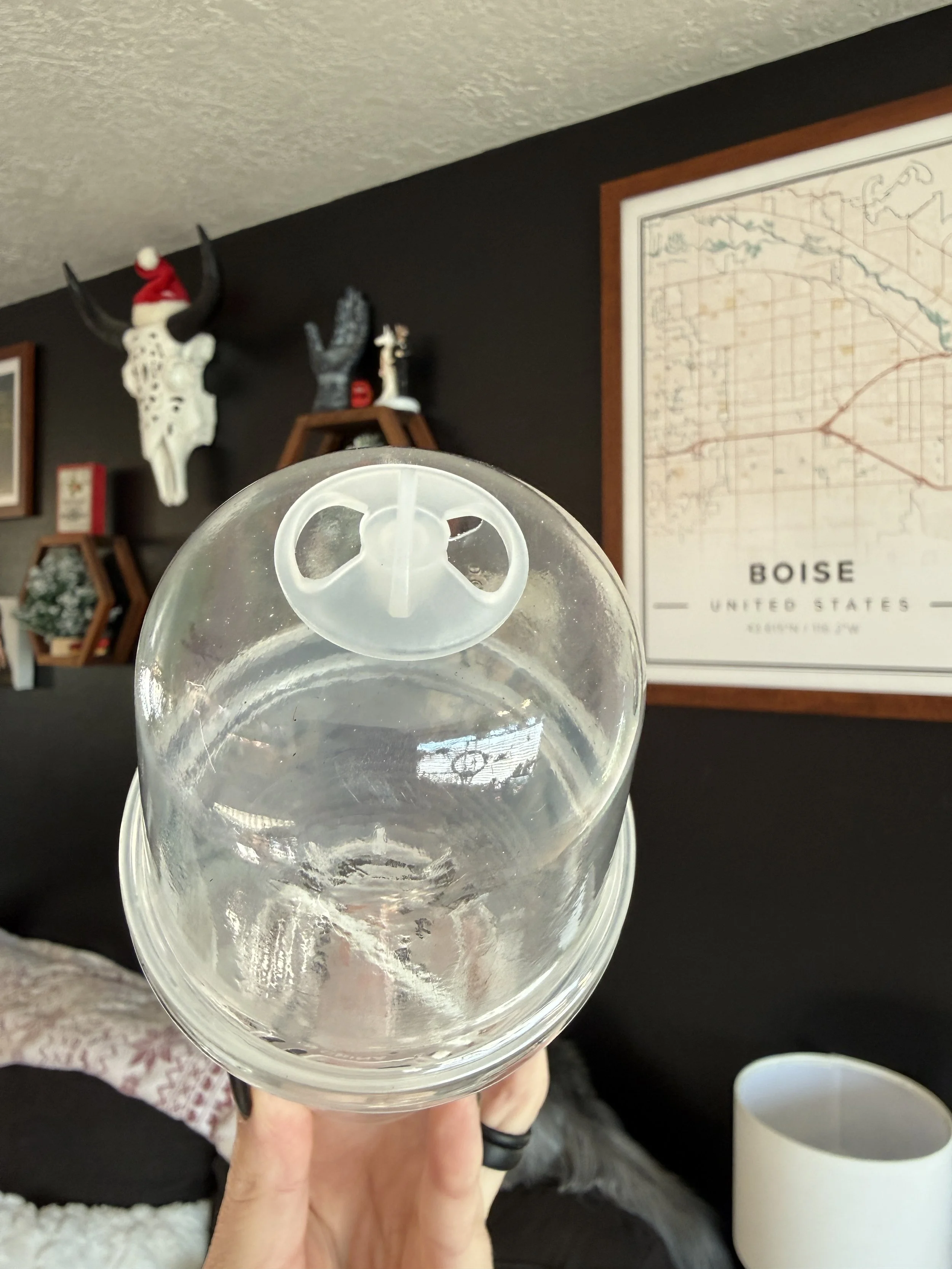 Close-up of clear dome showing ventilation opening and condensation