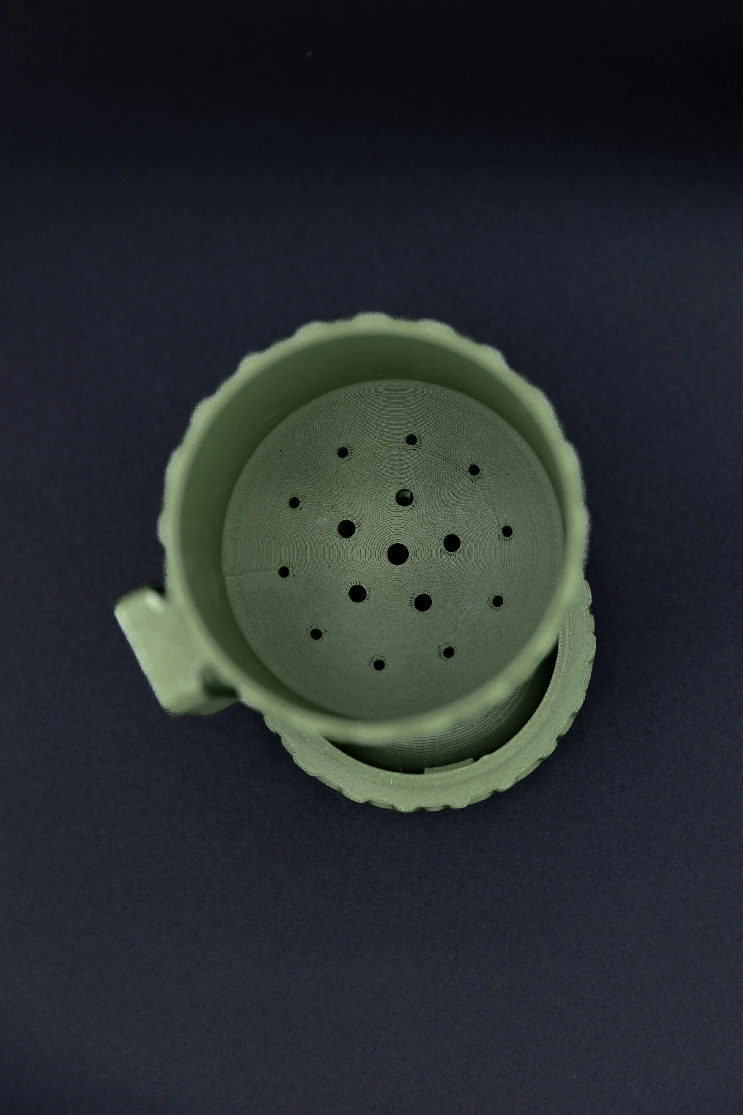 Top view of Boone planter drainage holes and removable drip tray (Copy)