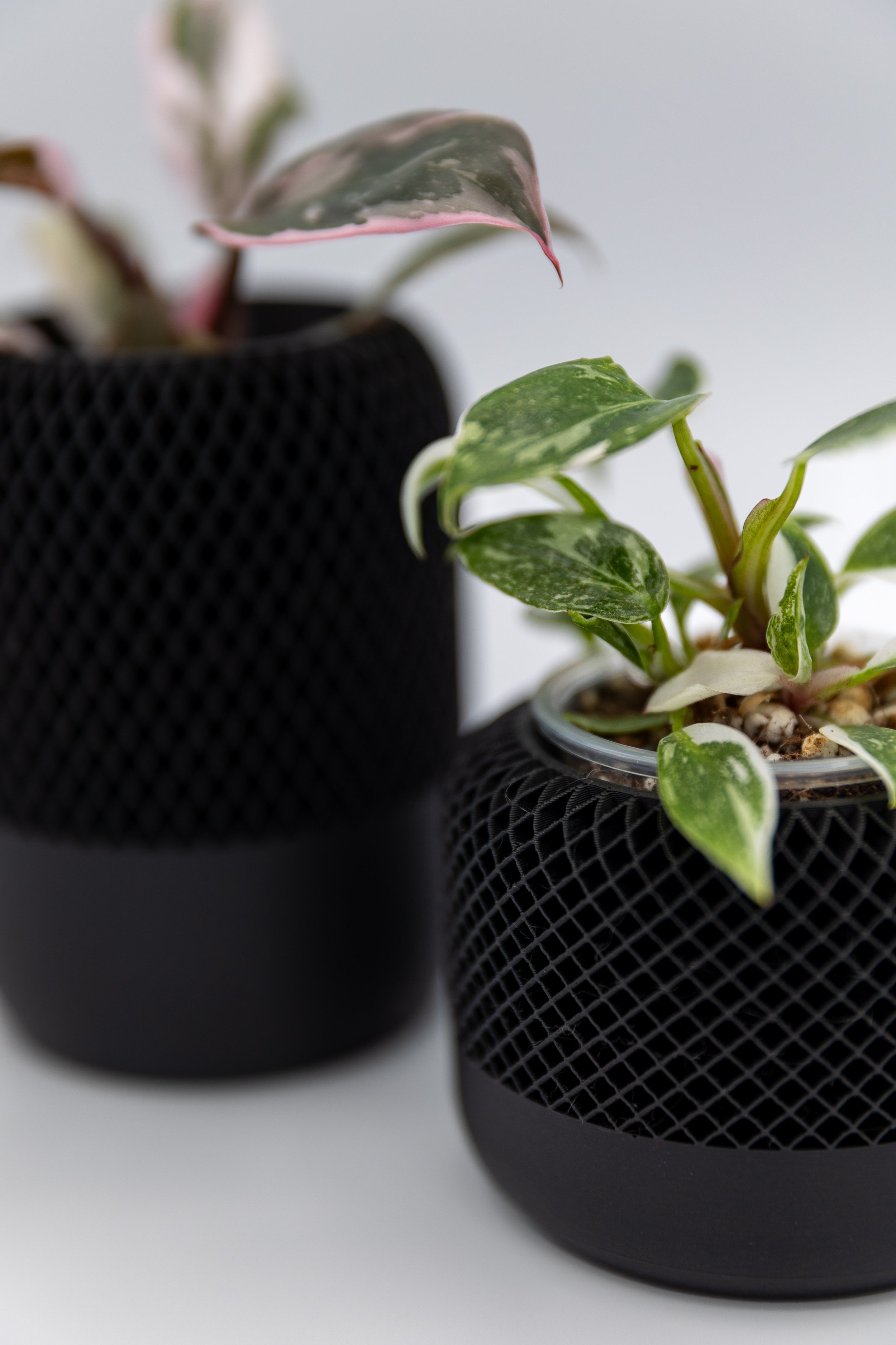 Close-up of the Night Drive Planter showing textured mesh speaker-inspired design.