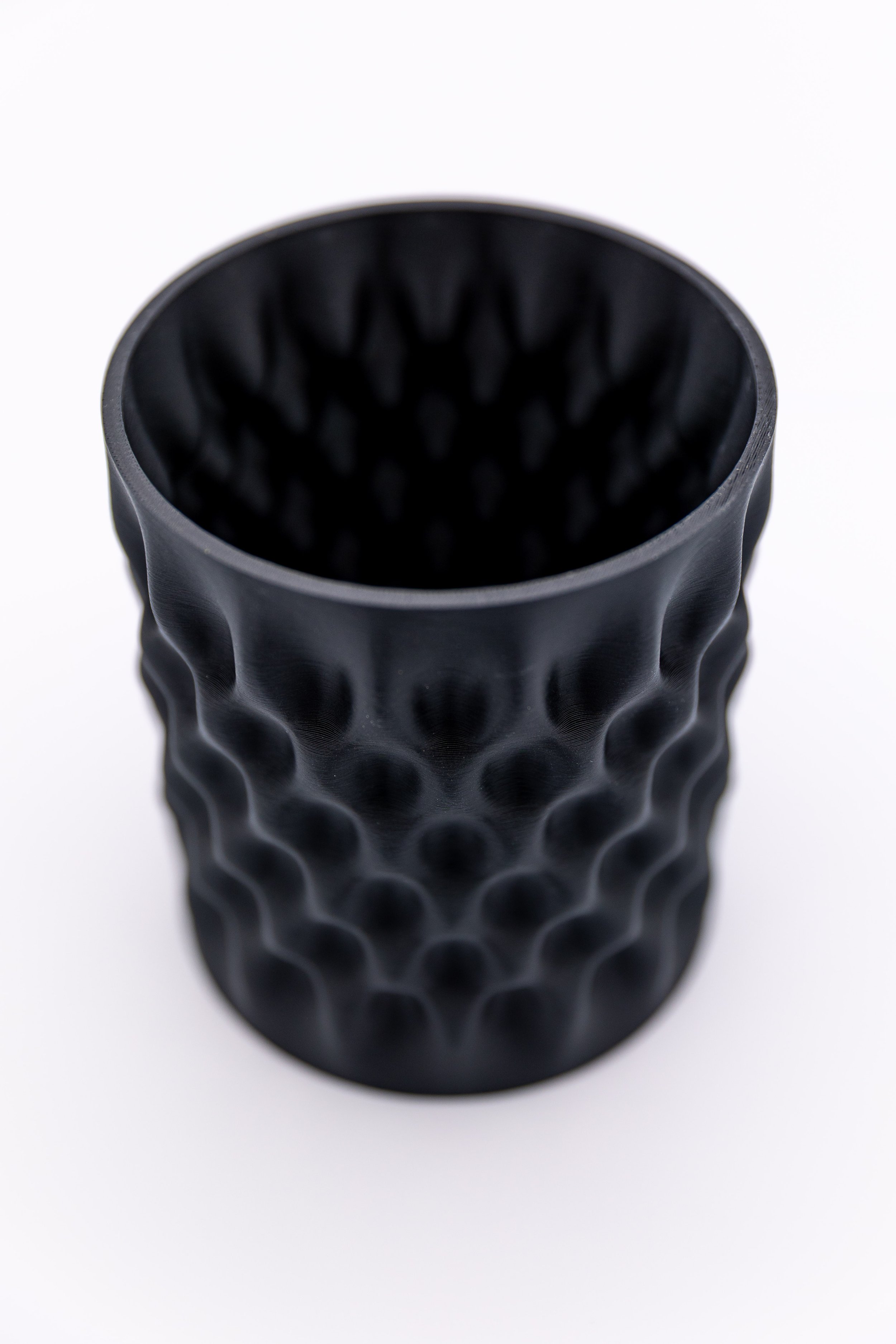 Top-down view of the Undertow Planter showcasing the smooth inner wall and rippling exterior design.