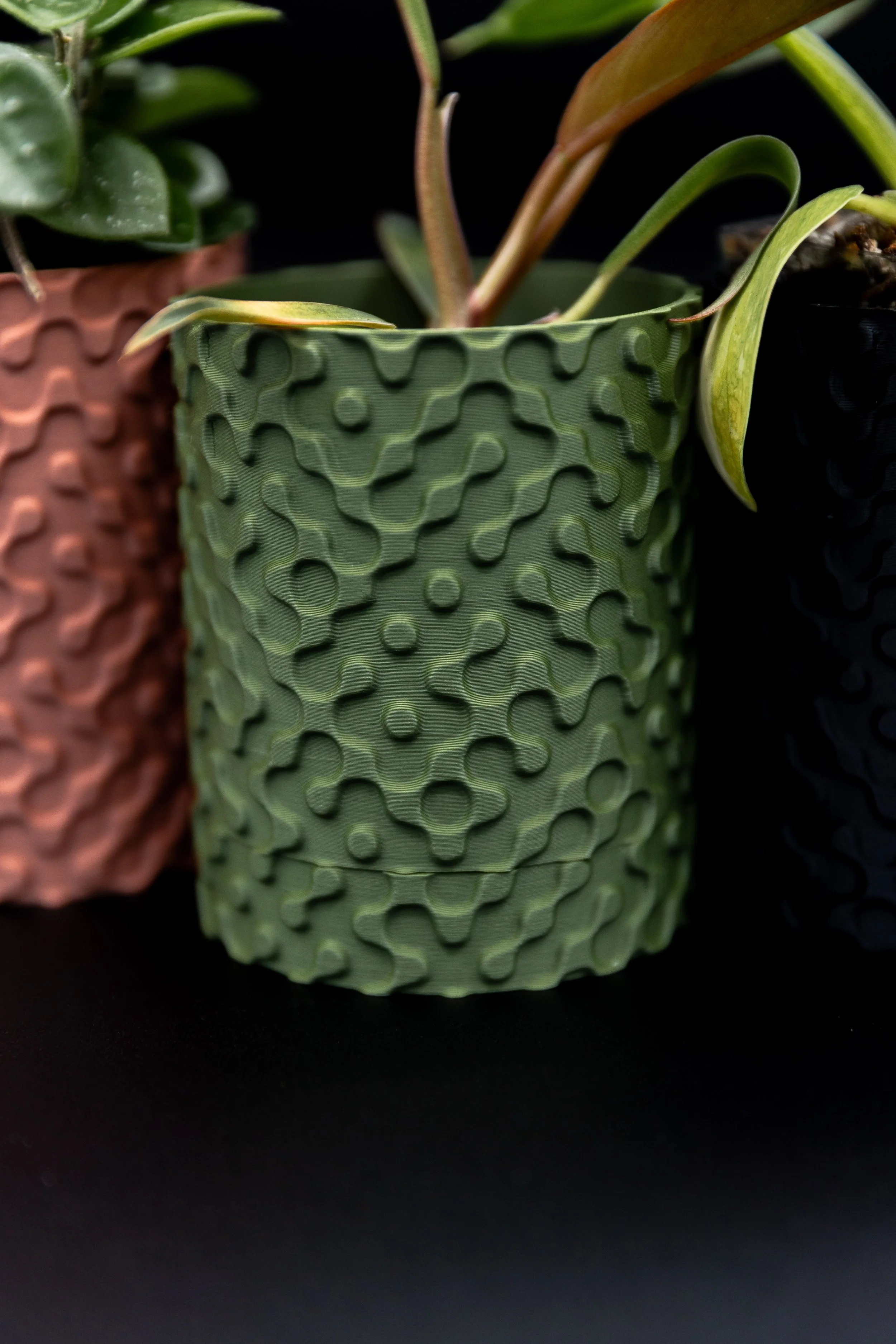 Close-up detail of Boone Planter texture in matte green (Copy)