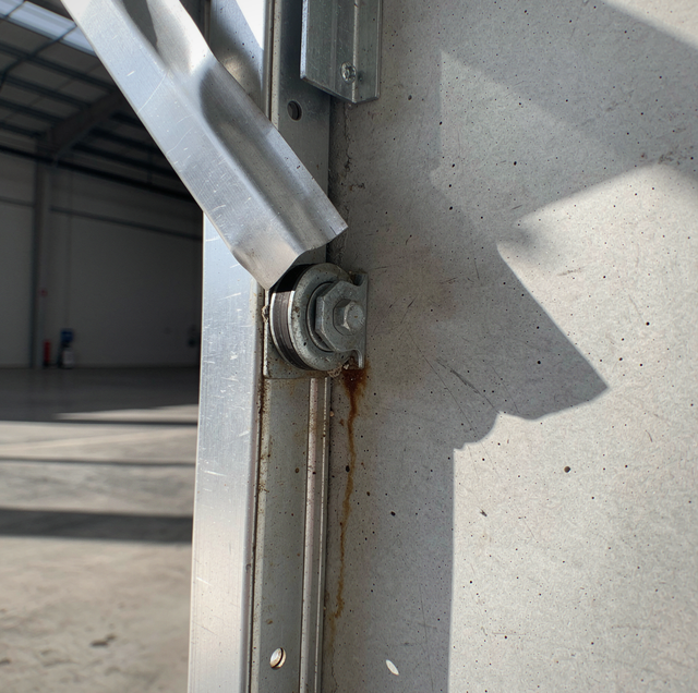 Commercial Door Off Track: 6 Causes to Rule Out