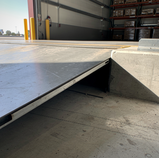 gap between loading dock door and concrete wall