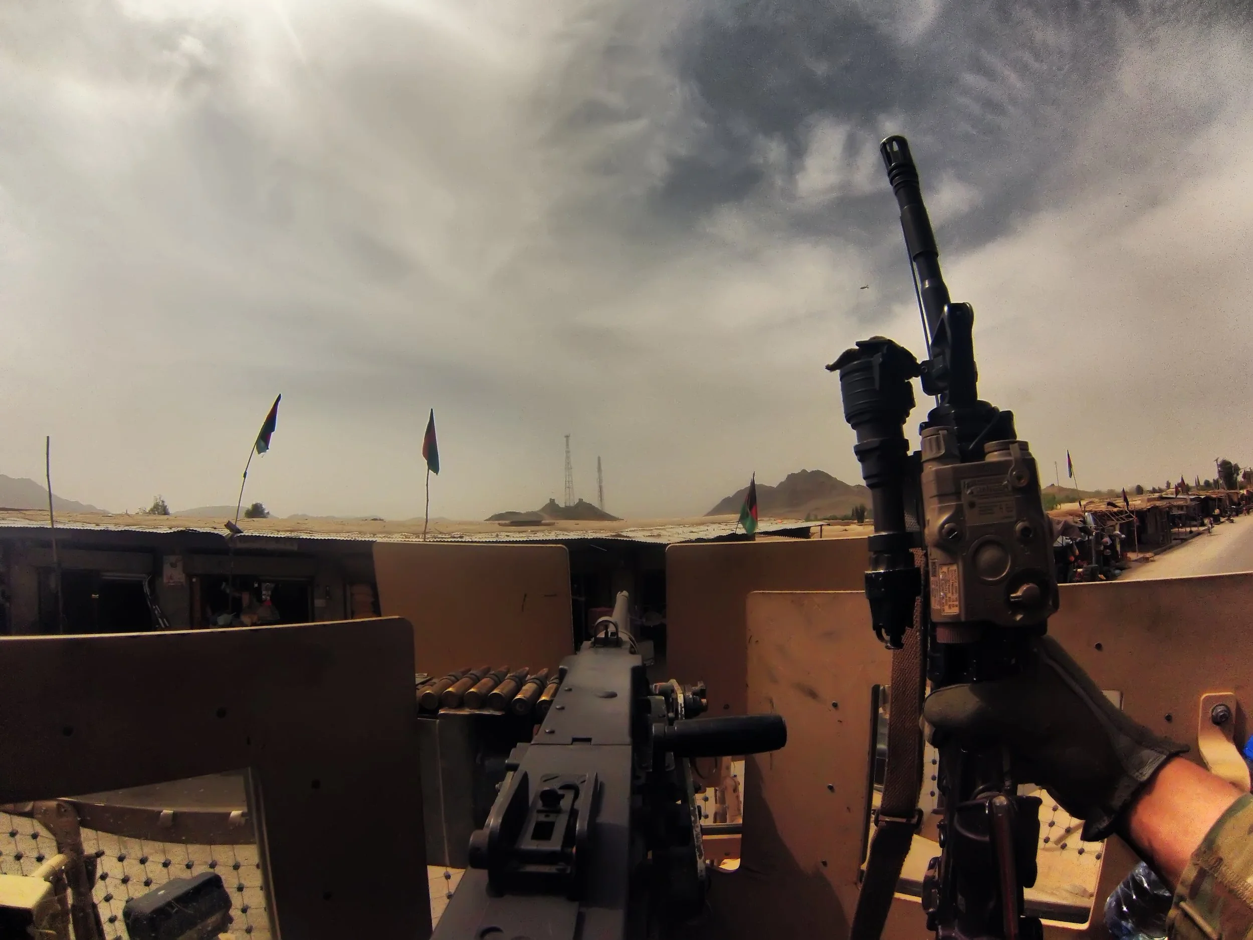 Spc. Matthew Zalewski holds his rifle as he patrols Bazaar-E Panjwai in Panjwai Afghanistan circa April 2013. 