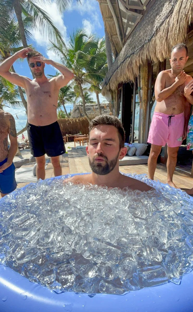 Photo of me in an ice bath at the Men of Means Retreat in Tulum