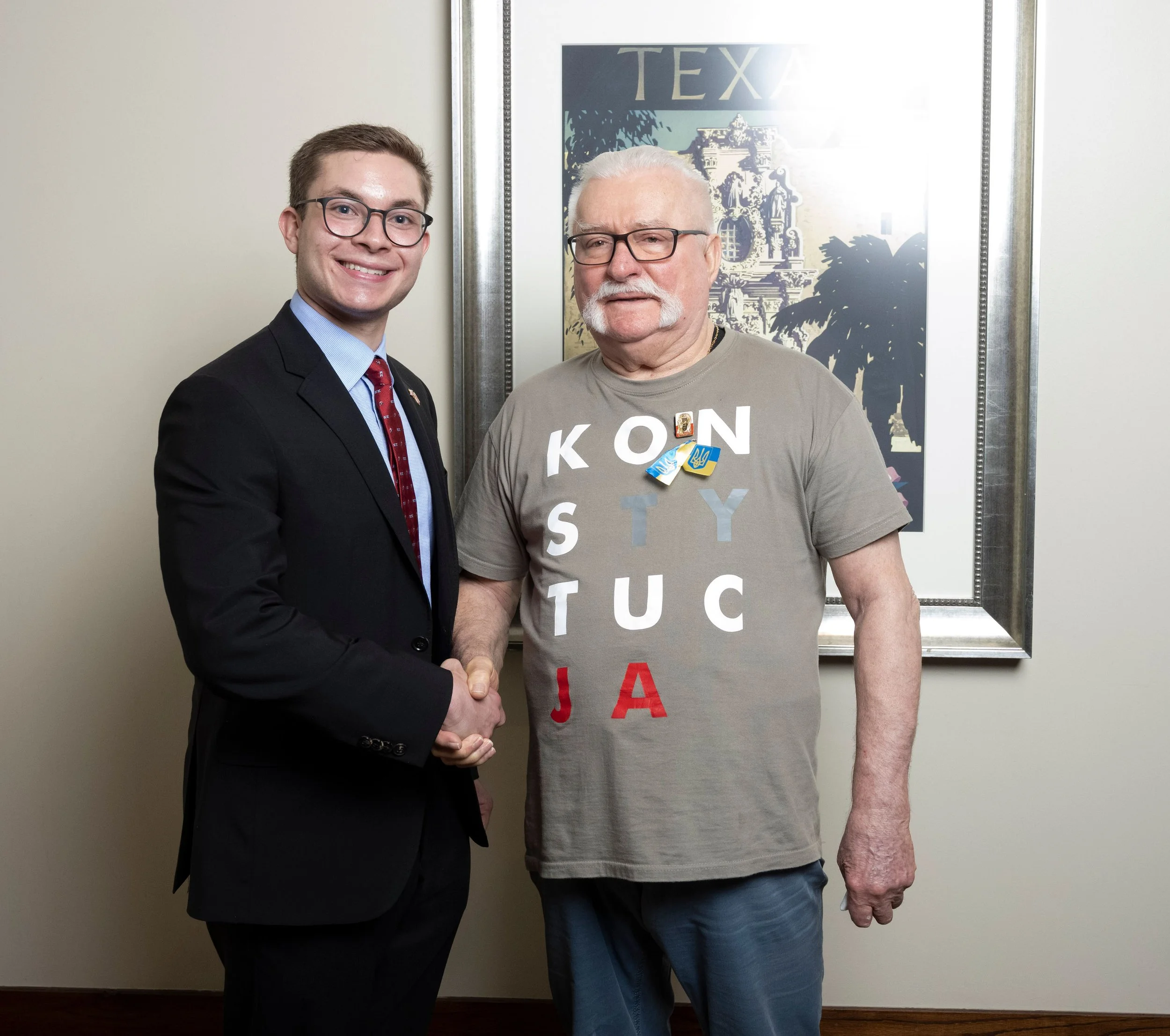 Shaking President Walesa's hand after his successful speech to the Polish Club at the University of Texas on May 5, 2022.