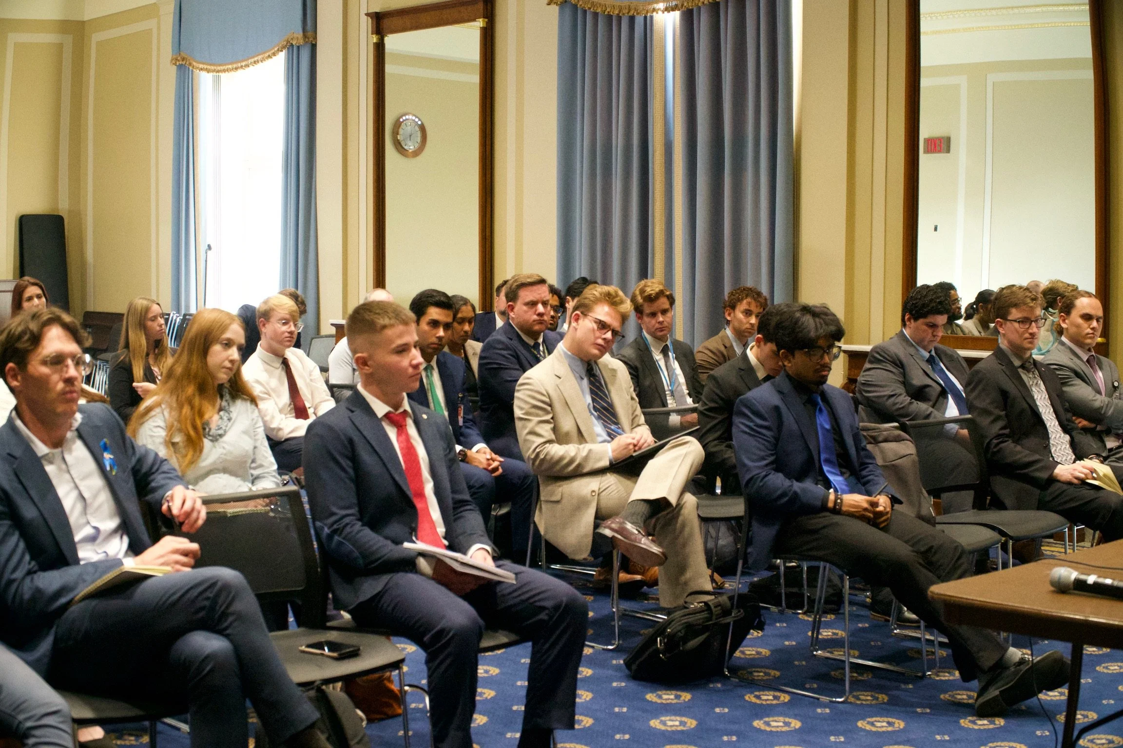 Crowd at event with Estonian Ambassador Kristjan Prikk.