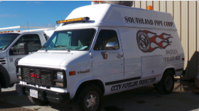 Emergency response vehicle with logo and text indicating urban airplane rescue, parked outdoors.
