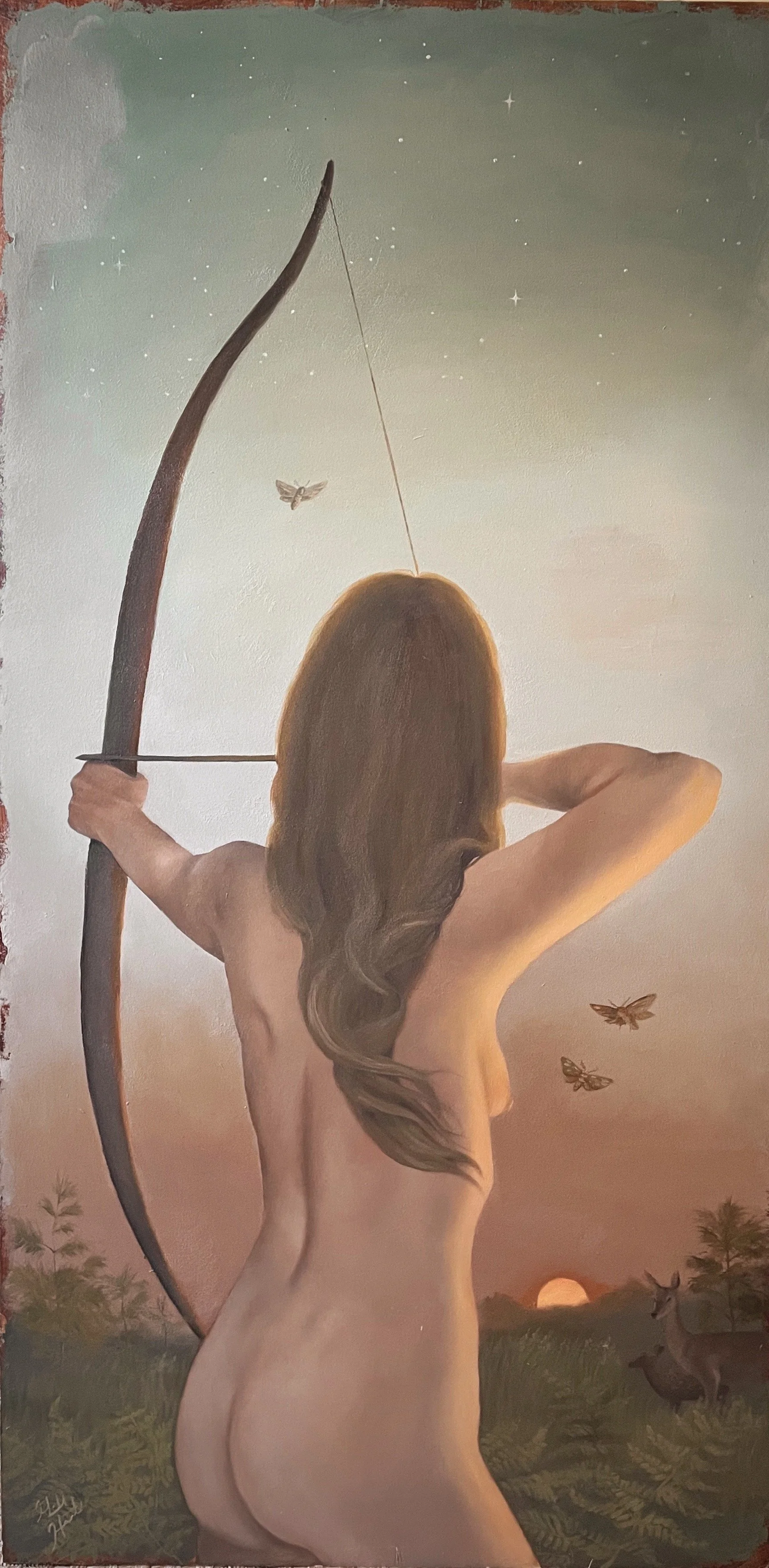 A realistic painting of a female nude archer drawing a recurve bow and arrow aiming off into the distance while the sunset casts a warm glow. Two deer stand in the background and three moths fly around her. Original oil painting.