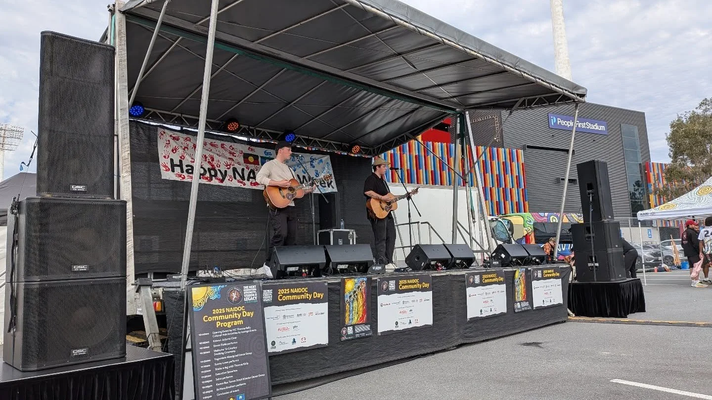 @kalwunofficial 
NAIDOC celebrations 2025

This year we provided:
- Large Trailer Stage
- PA Risers
- 3x Marquees
- Cable Management Trays
- Basic lighting
- Full Audio Production &amp; crew

2025 was the biggest celebration yet! And we're looking fo