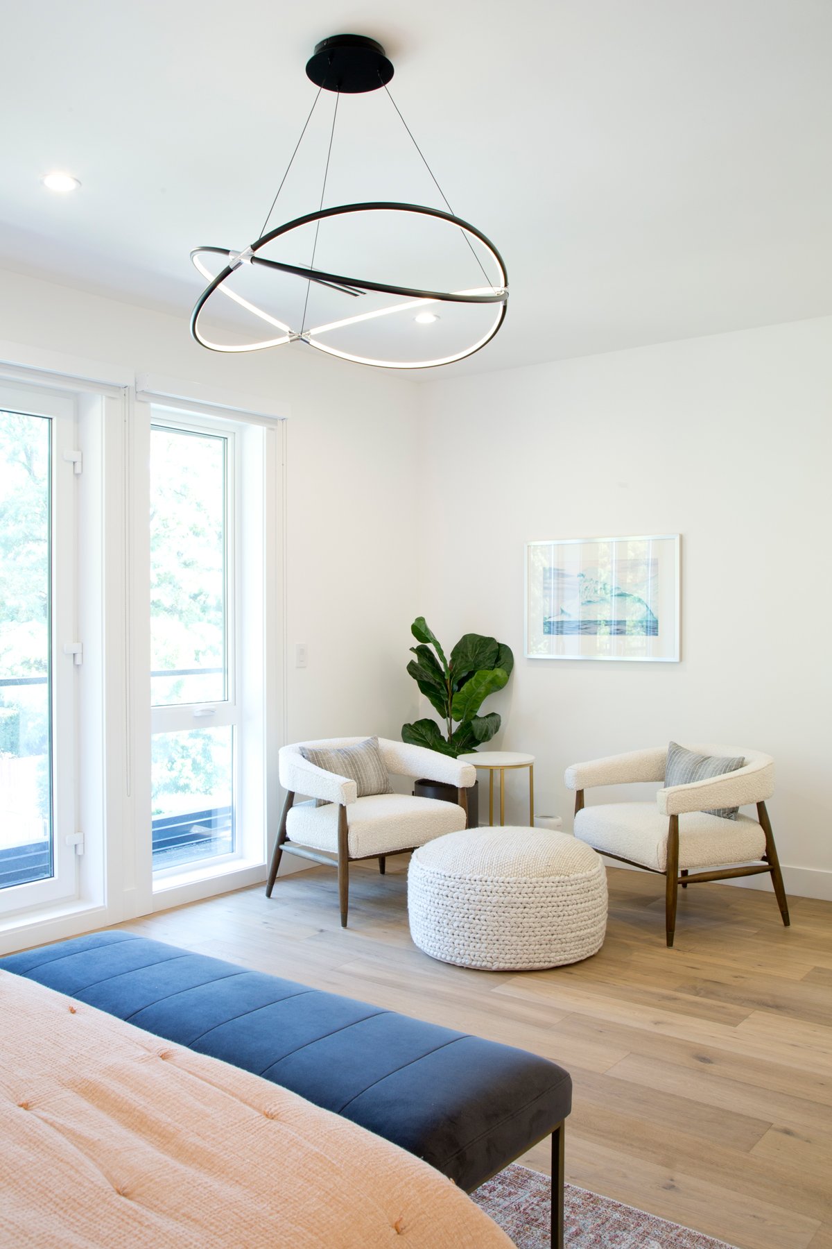 The South Slope project by Glenhaven Contracting Ltd. features a relaxing nook in the master bedroom.