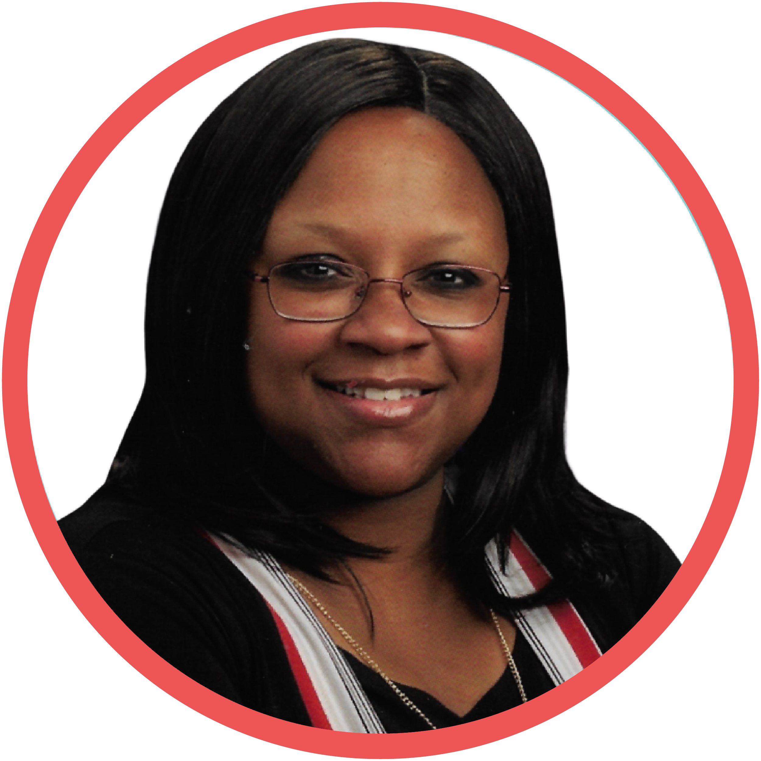 A woman with glasses and shoulder-length black hair, smiling, wearing a black top with a white and red striped collar, and a gold necklace.