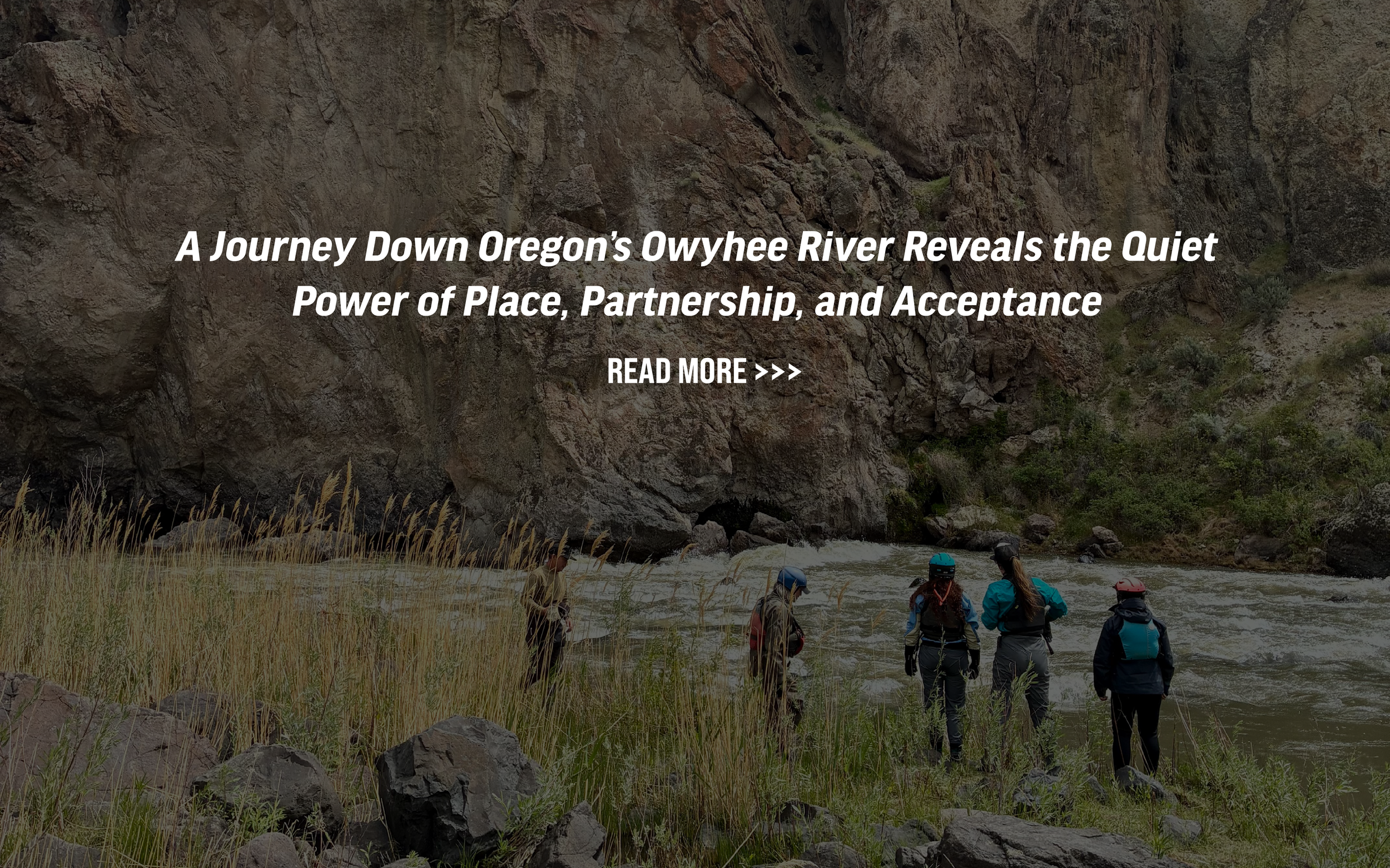 Several paddlers observing the Owyhee River.  Text that reads "A Journey Down Oregon’s Owyhee River Reveals the Quiet Power of Place, Partnership, and Acceptance." a button to read more is on the image.