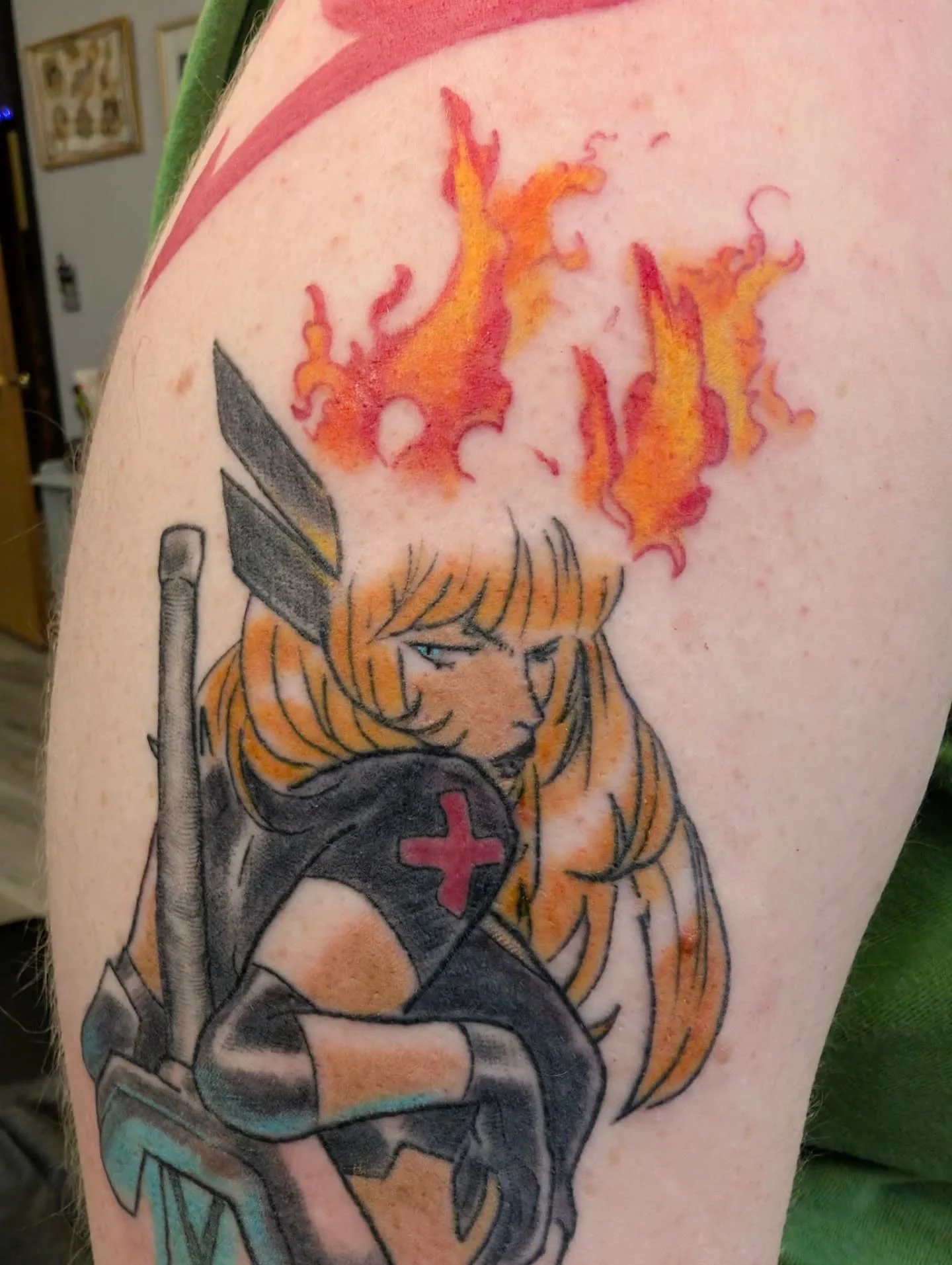 Magik 
From X-Men. 
I got to YouTube rabbit hole on all that Magik is about. Honestly, shes hella awesome and you should read her comics. 
Thank you Cole for adding to your comic arm sleeve.