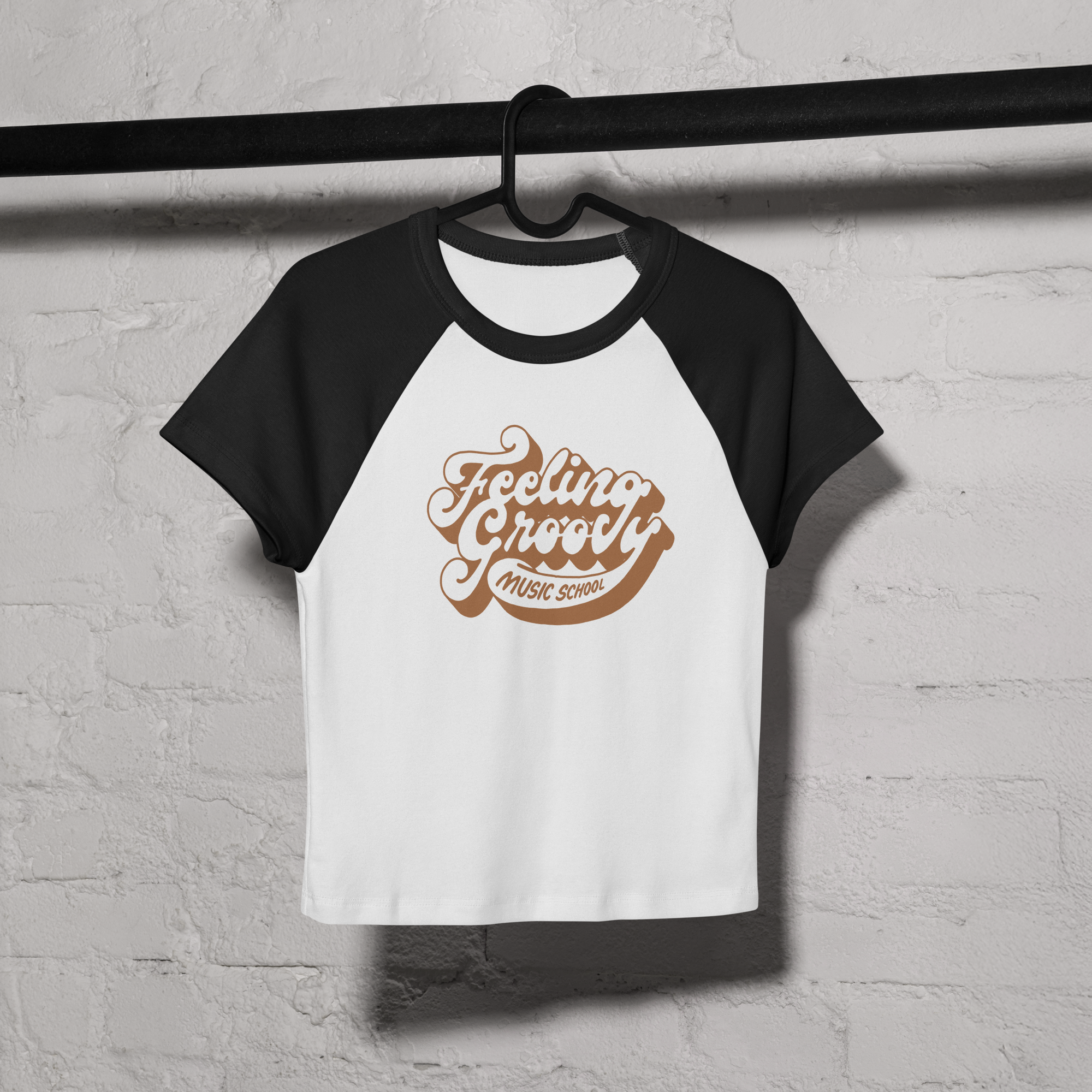 womens-micro-rib-raglan-baby-tee-white-black-front-6addab5158ea8.png