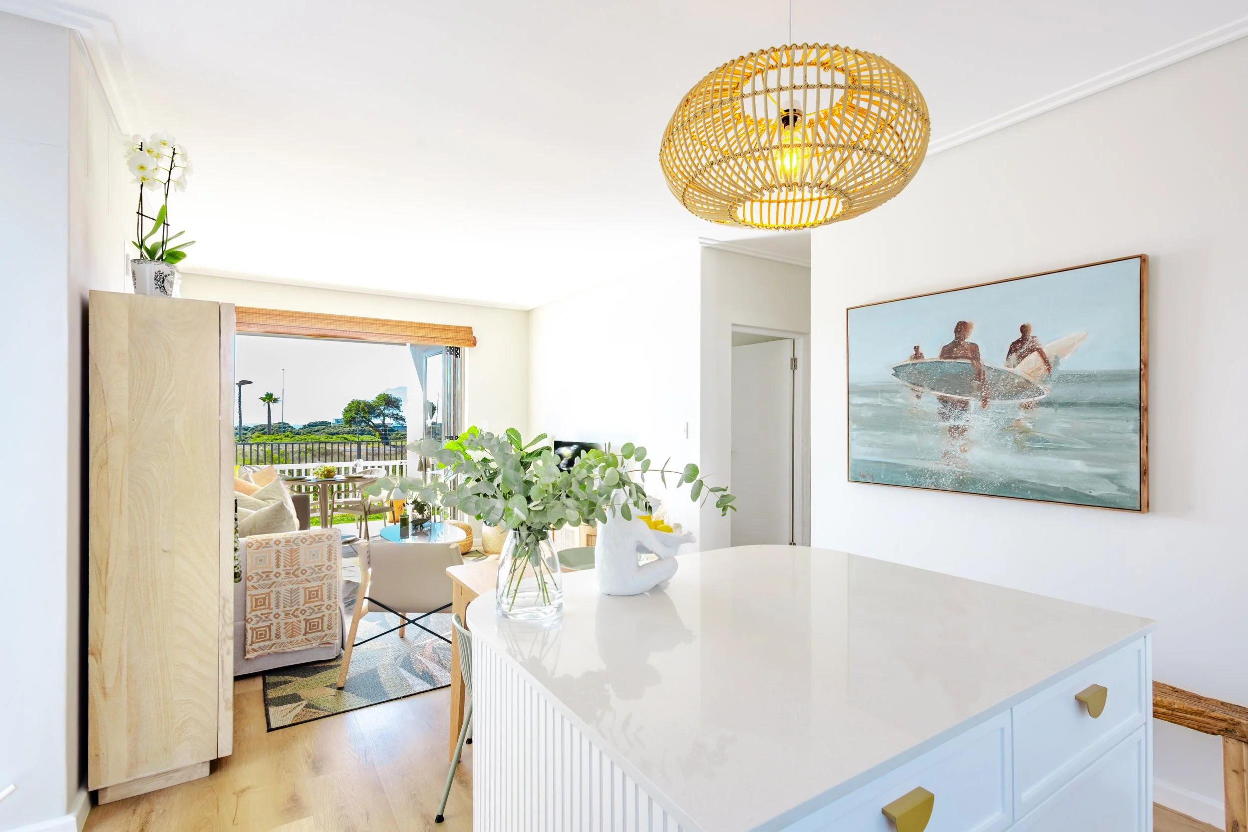 Bright open-plan living area in Cape Town Airbnb styled for guest comfort