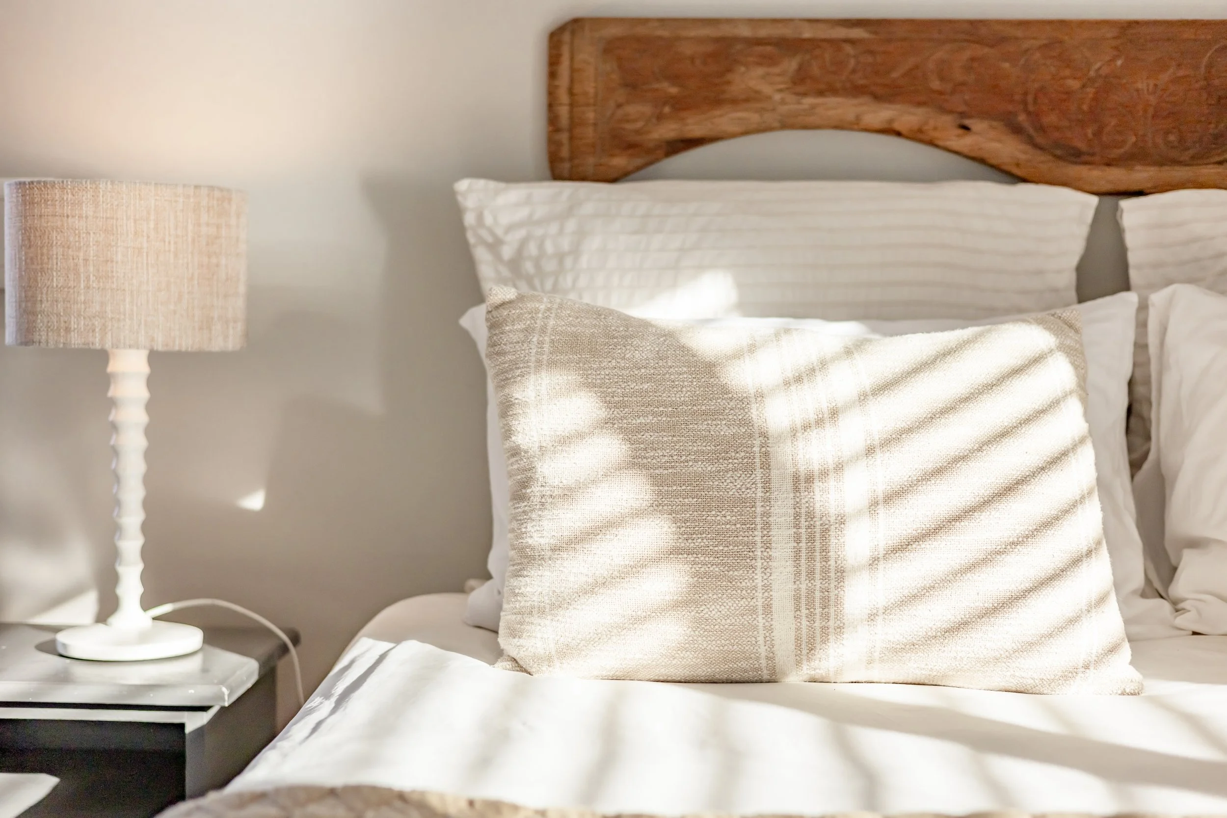 Close-up of a professionally styled bedroom showcasing premium bedding for an Airbnb property in Cape Town.