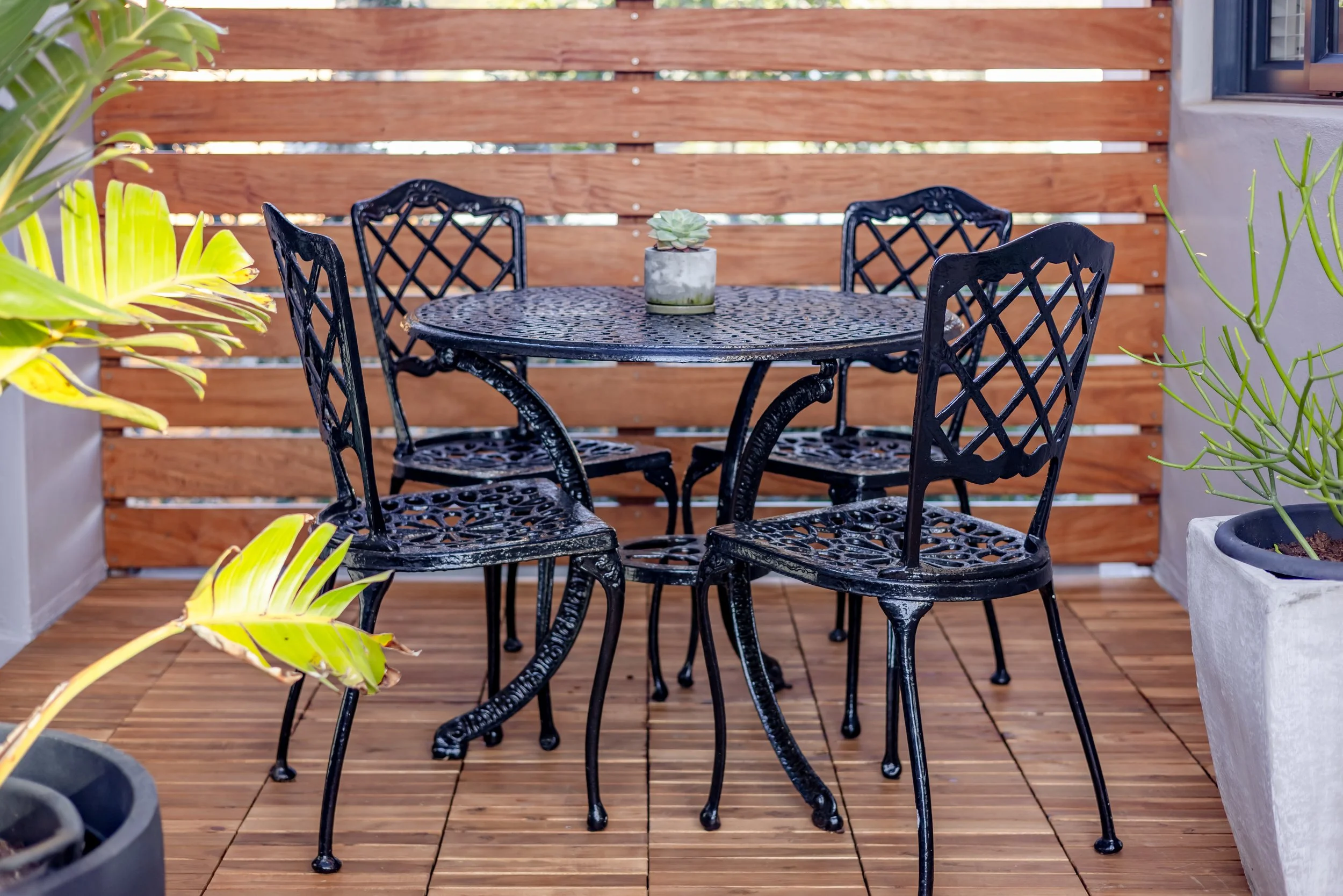 Outdoor patio with dining area photographed for a holiday rental and Airbnb accommodation in Cape Town.
