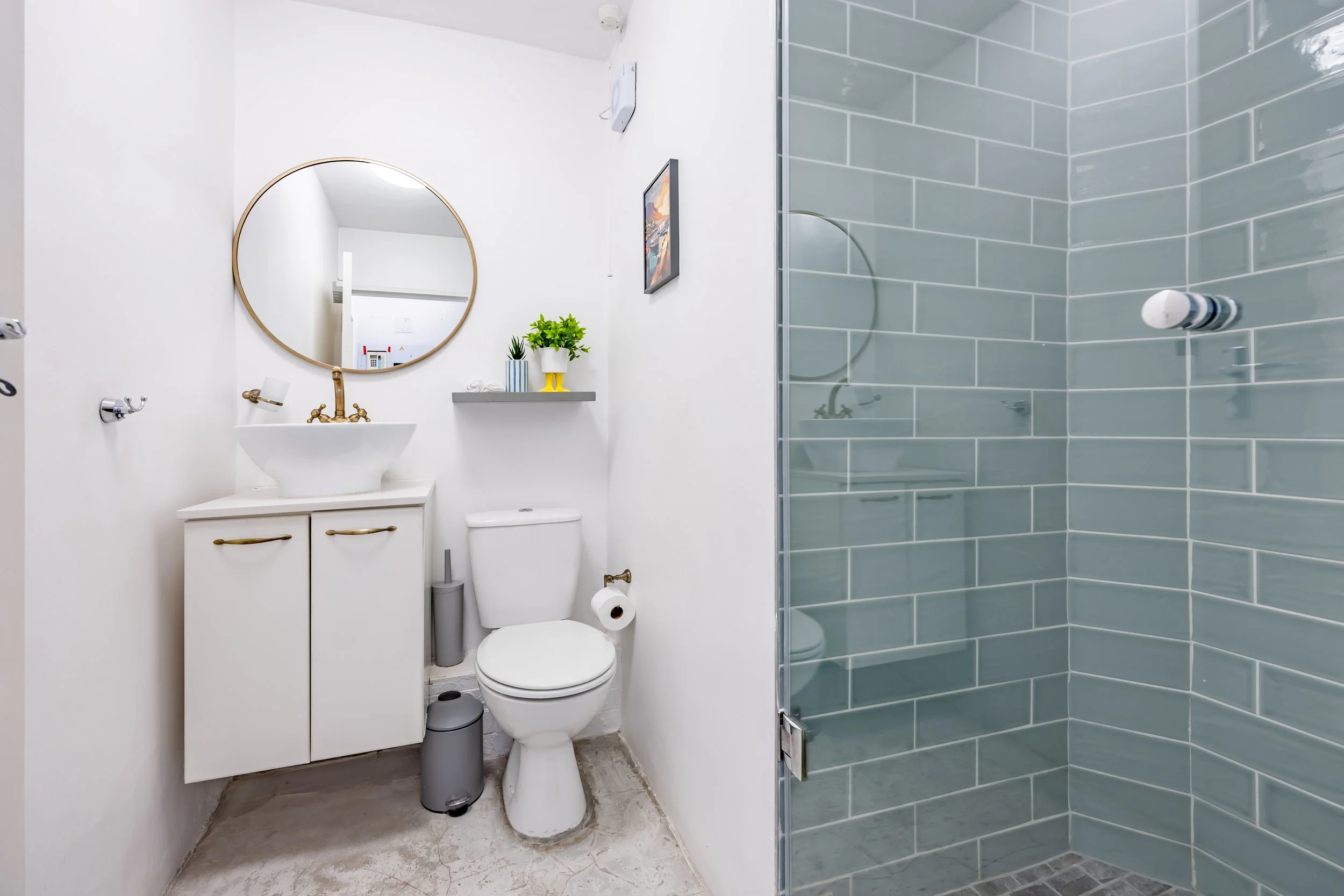Clean, modern bathroom photographed at a Kalk Bay holiday apartment in Cape Town, showcasing the property's fixtures, finishes and coastal-inspired interior design.