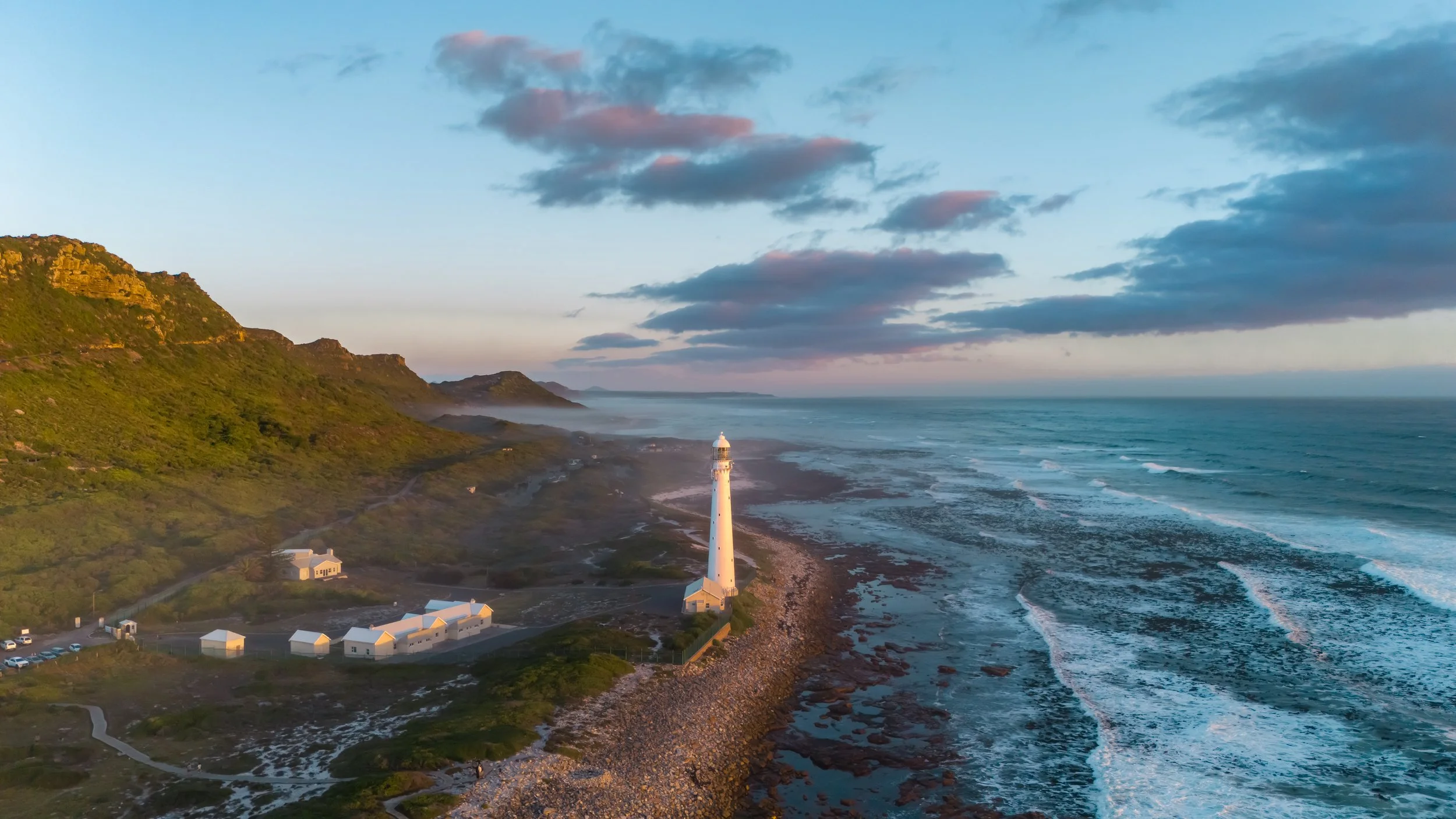 The historic Slangkop Lighthouse, completed in 1919 and standing 33 meters tall.