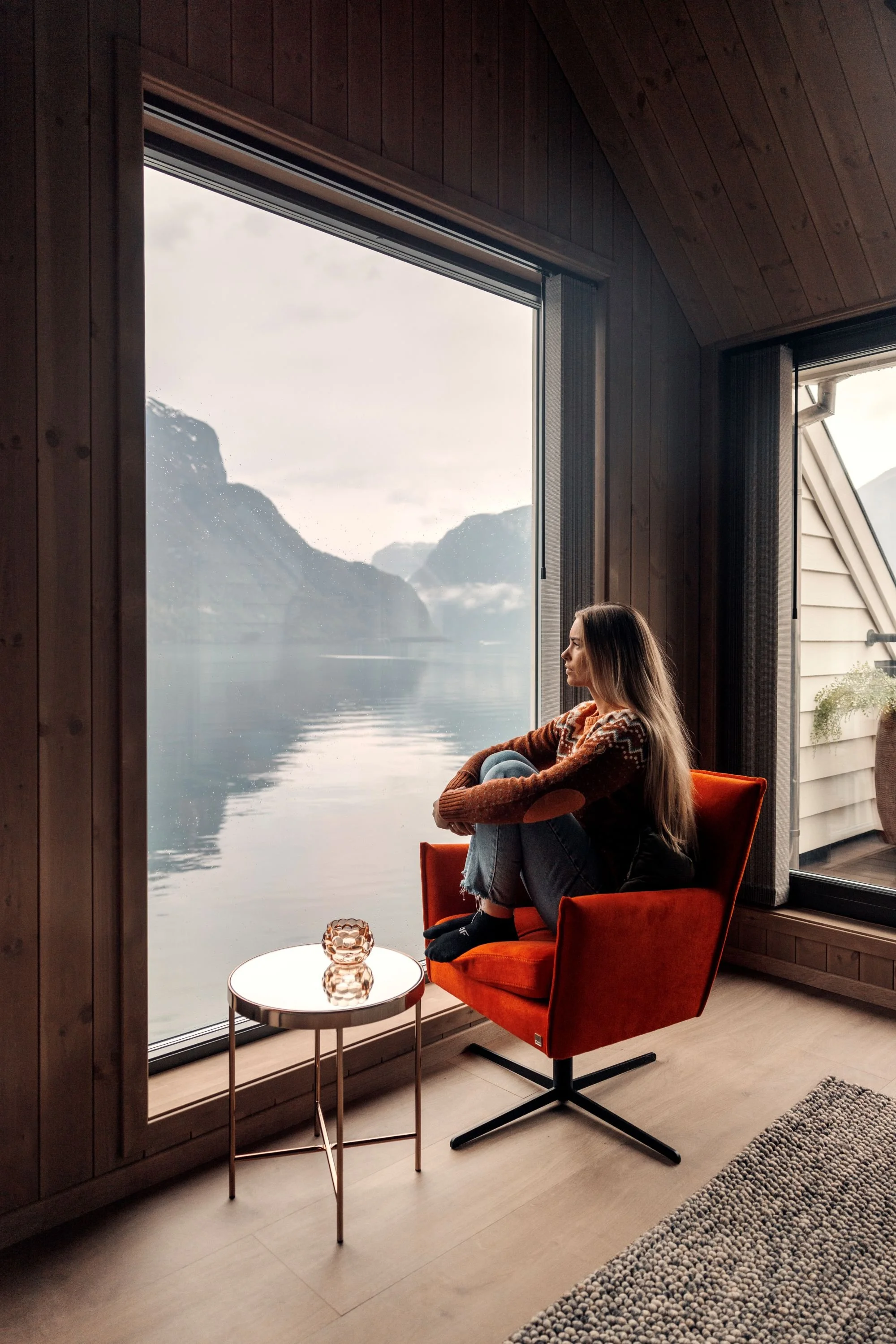 Girl enjoying the view of the aurlandsfjord from Wangen apartments