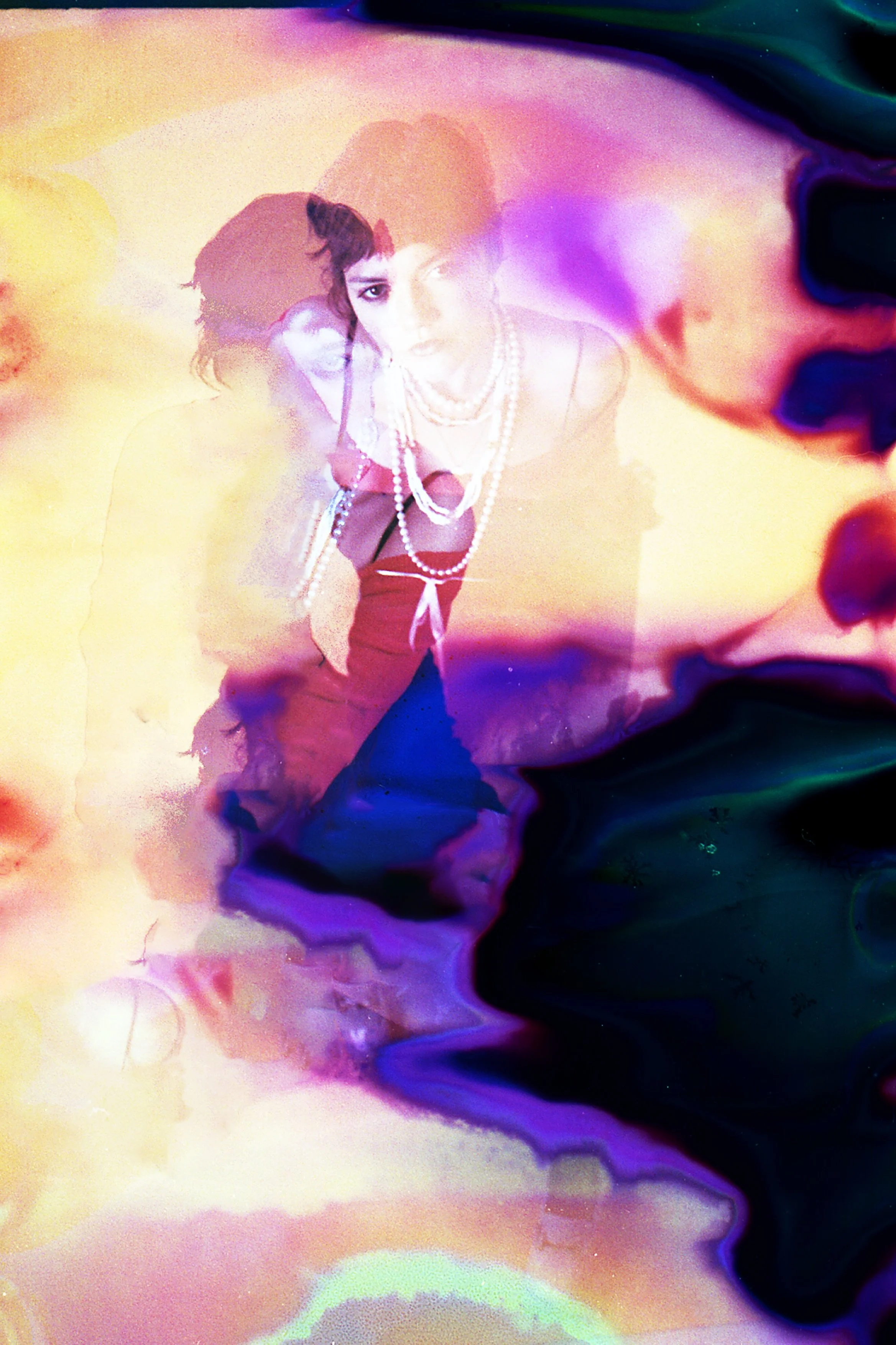 Dreamlike film soup image of a figure dissolving into purple, orange and dark chemical clouds. Chemical Subscura by Hartenjager.