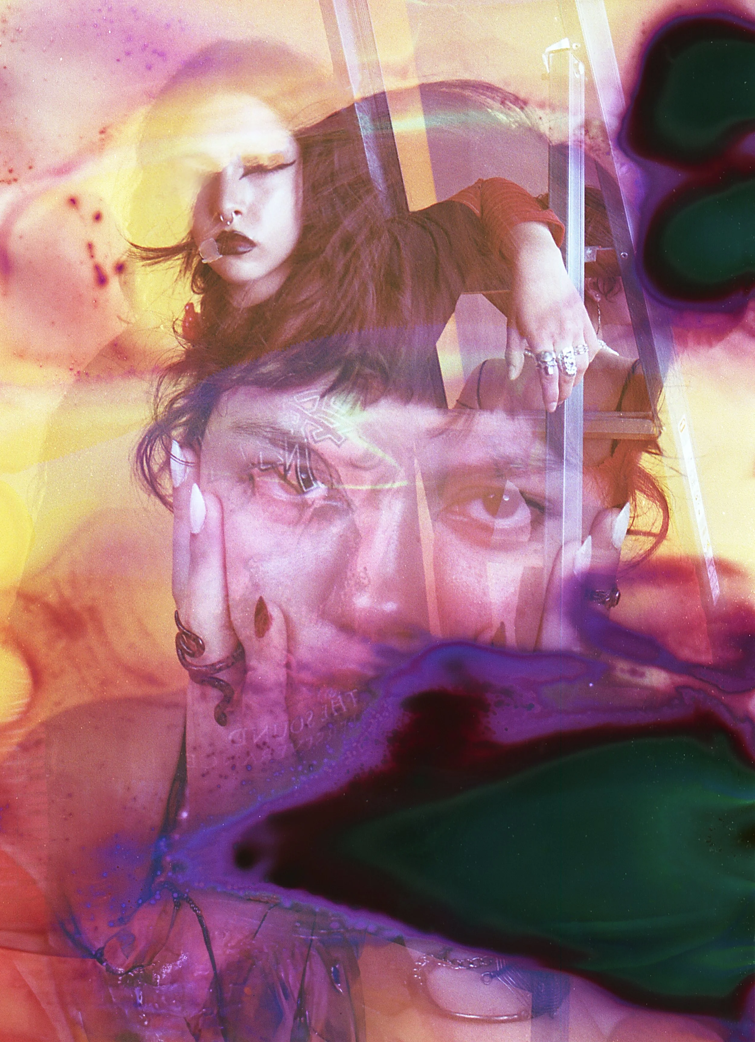 Souped negative of a face with a short fringe, stained with purple and green chemical blots. Chemical Subscura by Hartenjager.