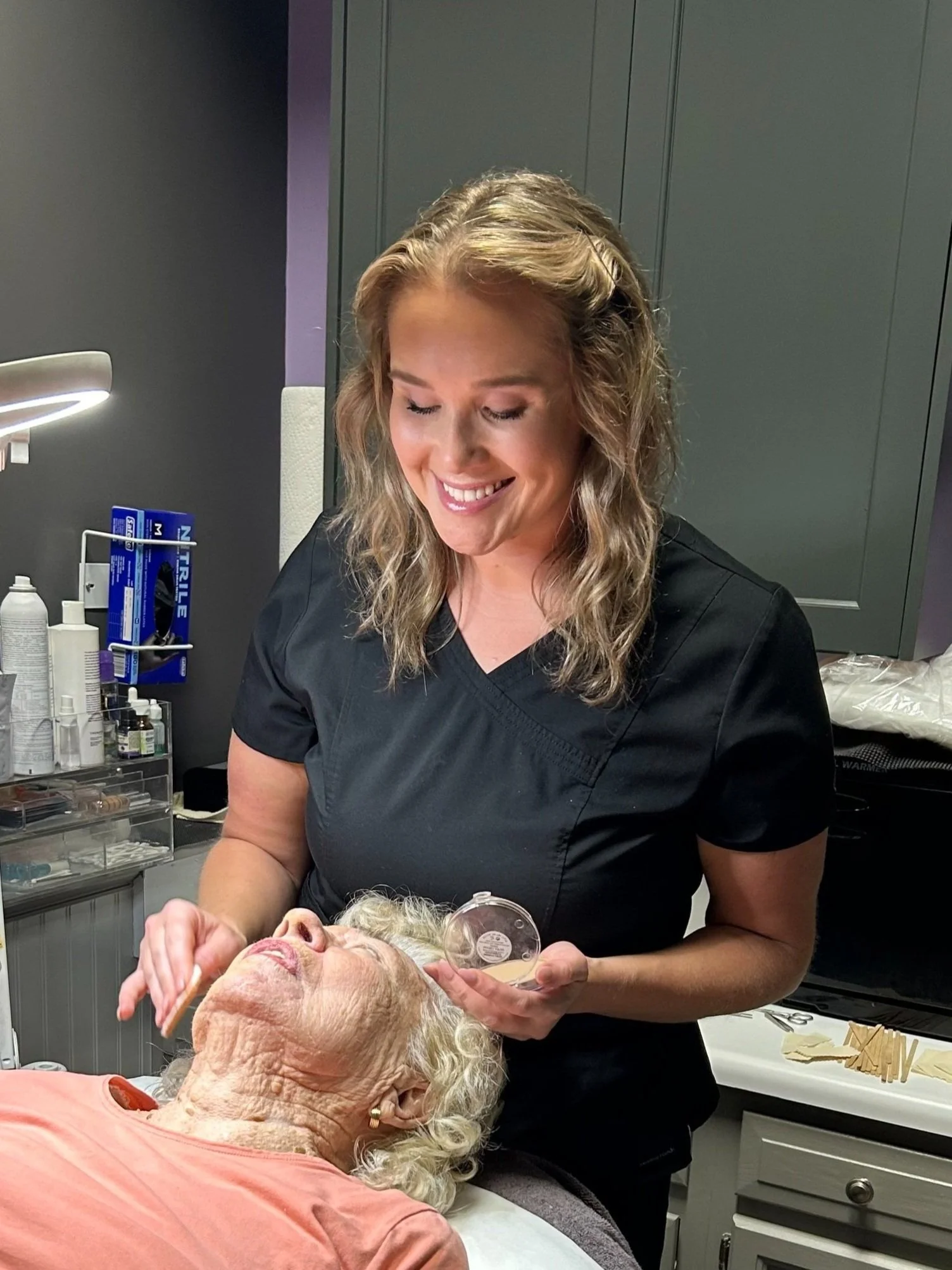 Katie B with a client in her Greensboro, NC  studio