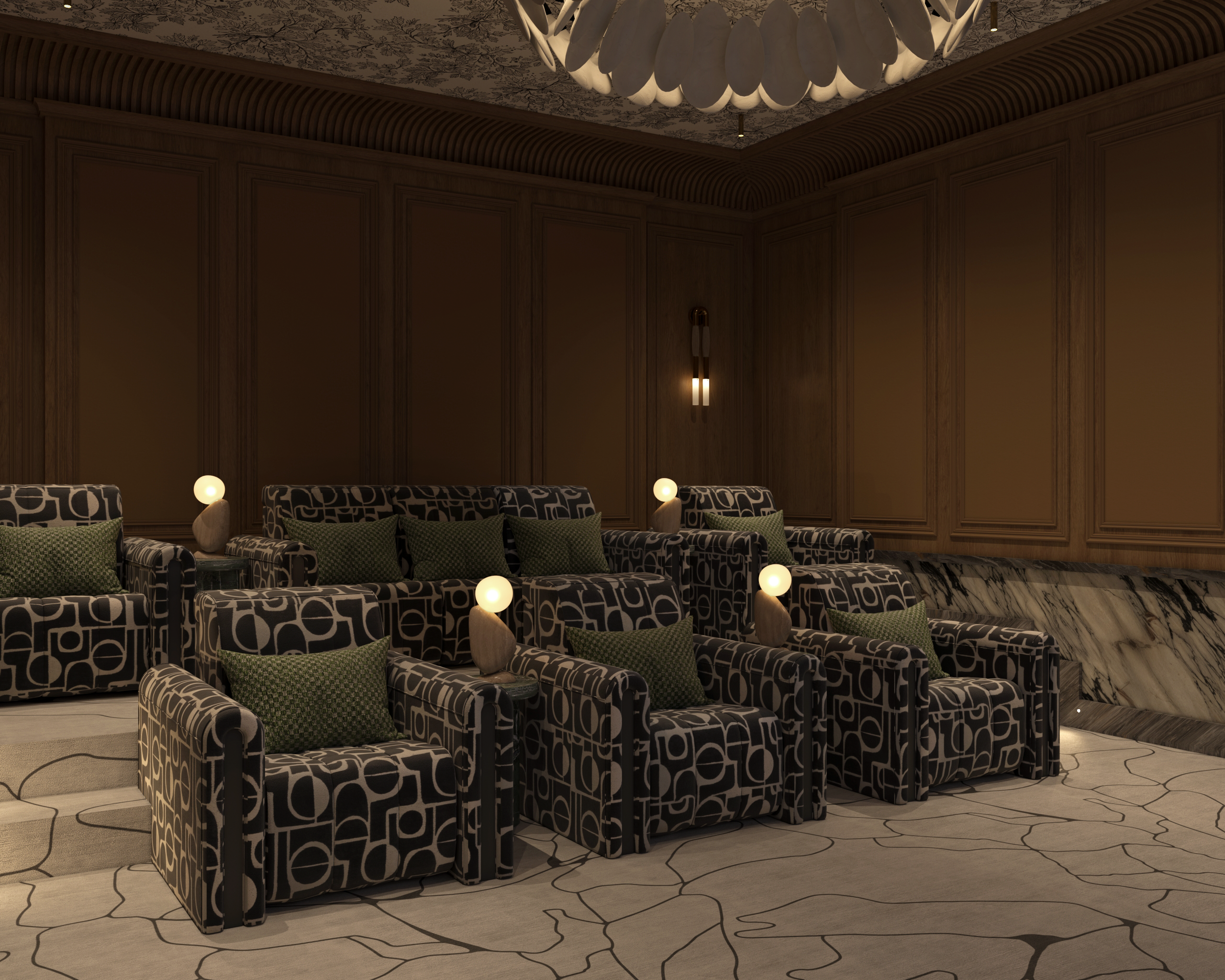 A seating area with black and white patterned armchairs, each with a green cushion. Small table lamps with globe-shaped bulbs and curved wooden bases are on the armrests. The background features wood-paneled walls, a textured ceiling, and modern wall