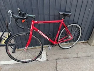 Men's Road Bike.
Brand Nishiki 
Large size frame would generally fit a rider who is 5' 8" to 6' 2". 
Integrated brakes and index shifting. This bike is in great shape. New Bar wrap and completely new shifting and brake cables.
Eight speed cassette on