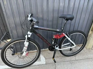 Genisis Velo
New 27.5 X 2.10 tires and tubes. New intregrated brake and trigger shifters. 
Front disk brakes. 200.00