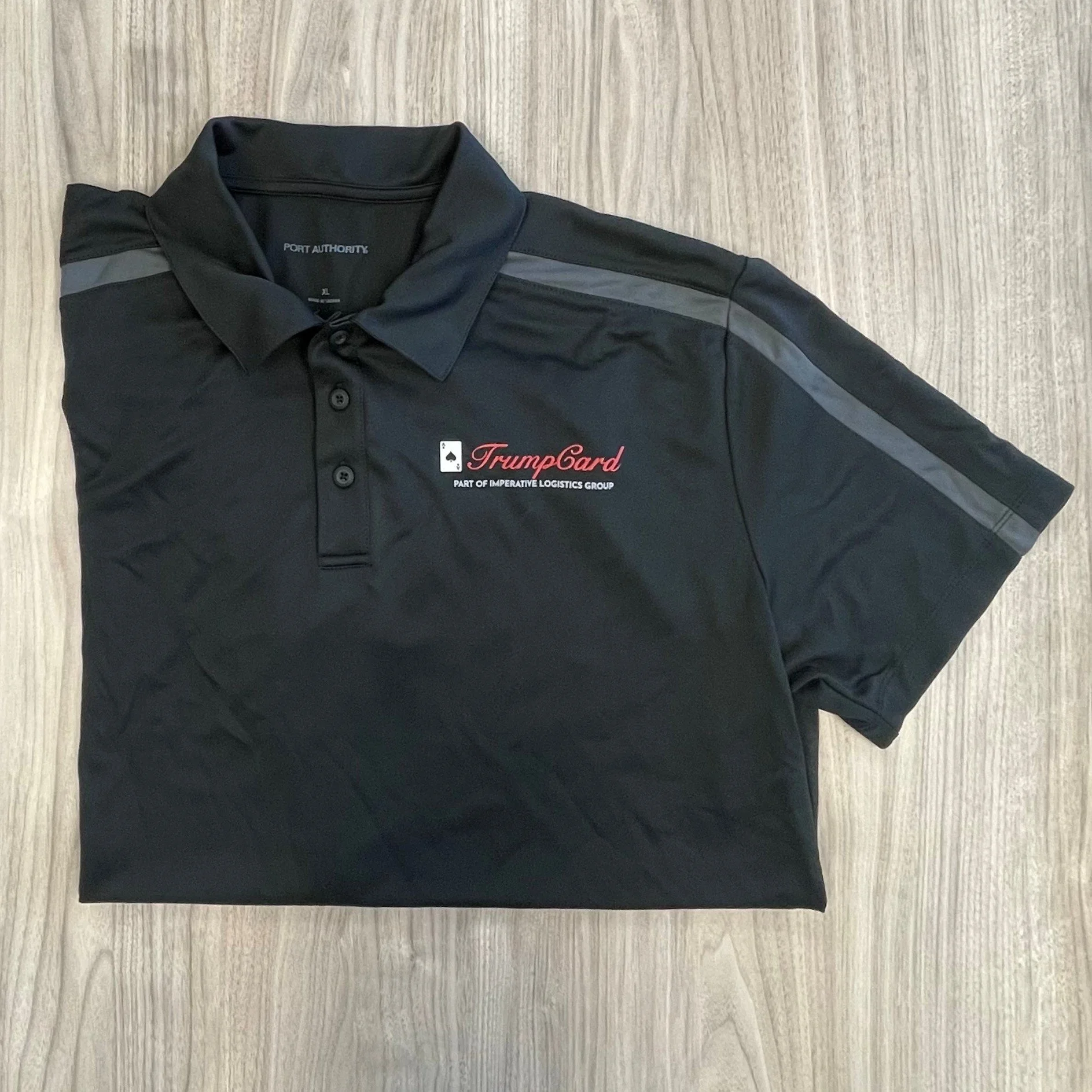 TrumpCard Driver Black Polo with Reflective Shoulder Accents