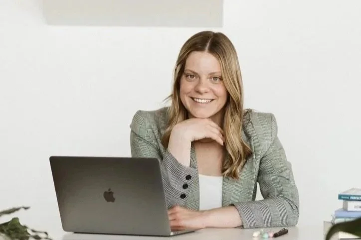 expert_grant_writer_sitting_next_to_computer