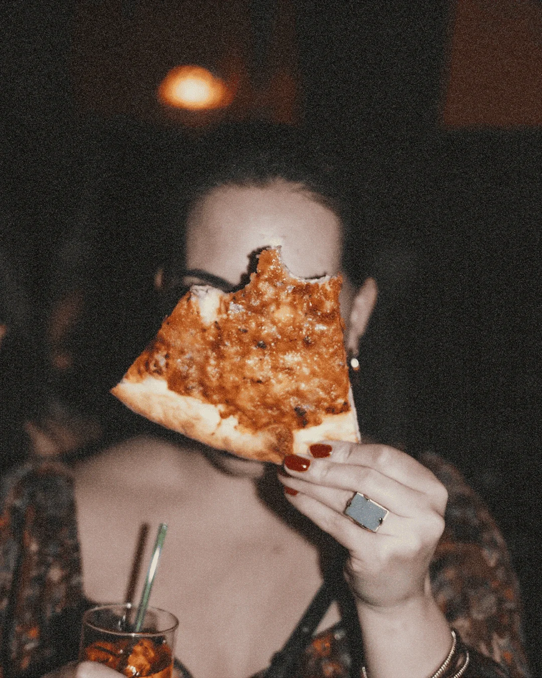 Woman enjoying NYC's best pizza party