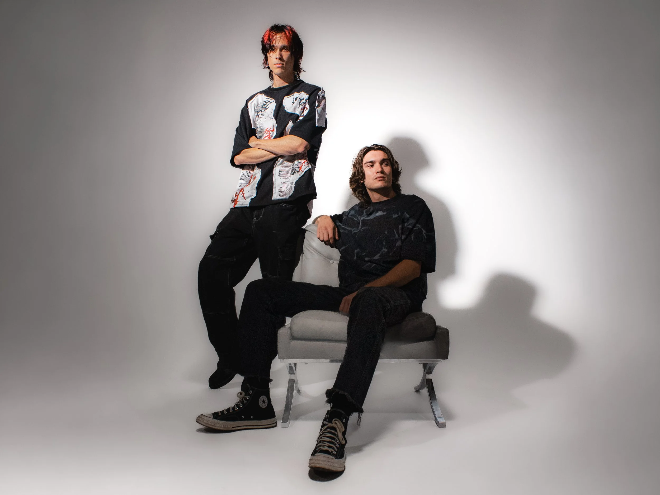 2 people with chair.jpg