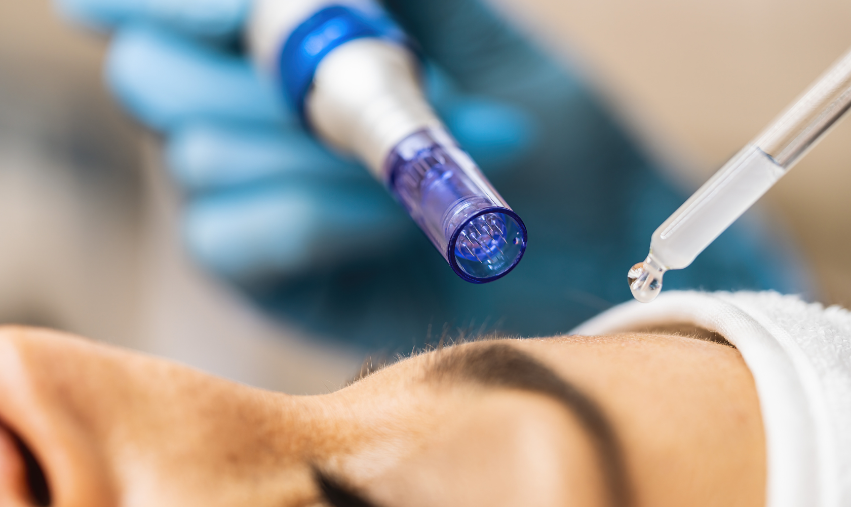 Close-up of a medical procedure showing a patient's face and a syringe with a drop of fluid, with a gloved hand holding a tool near the patient's eye.