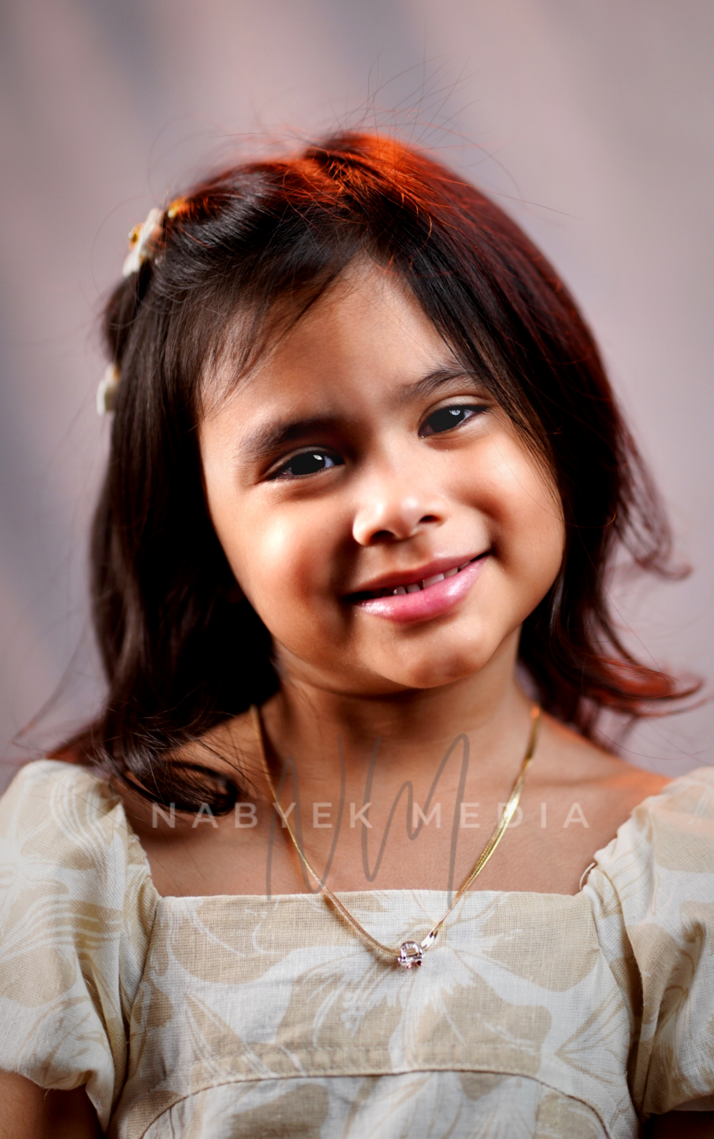 little girl posing smiling