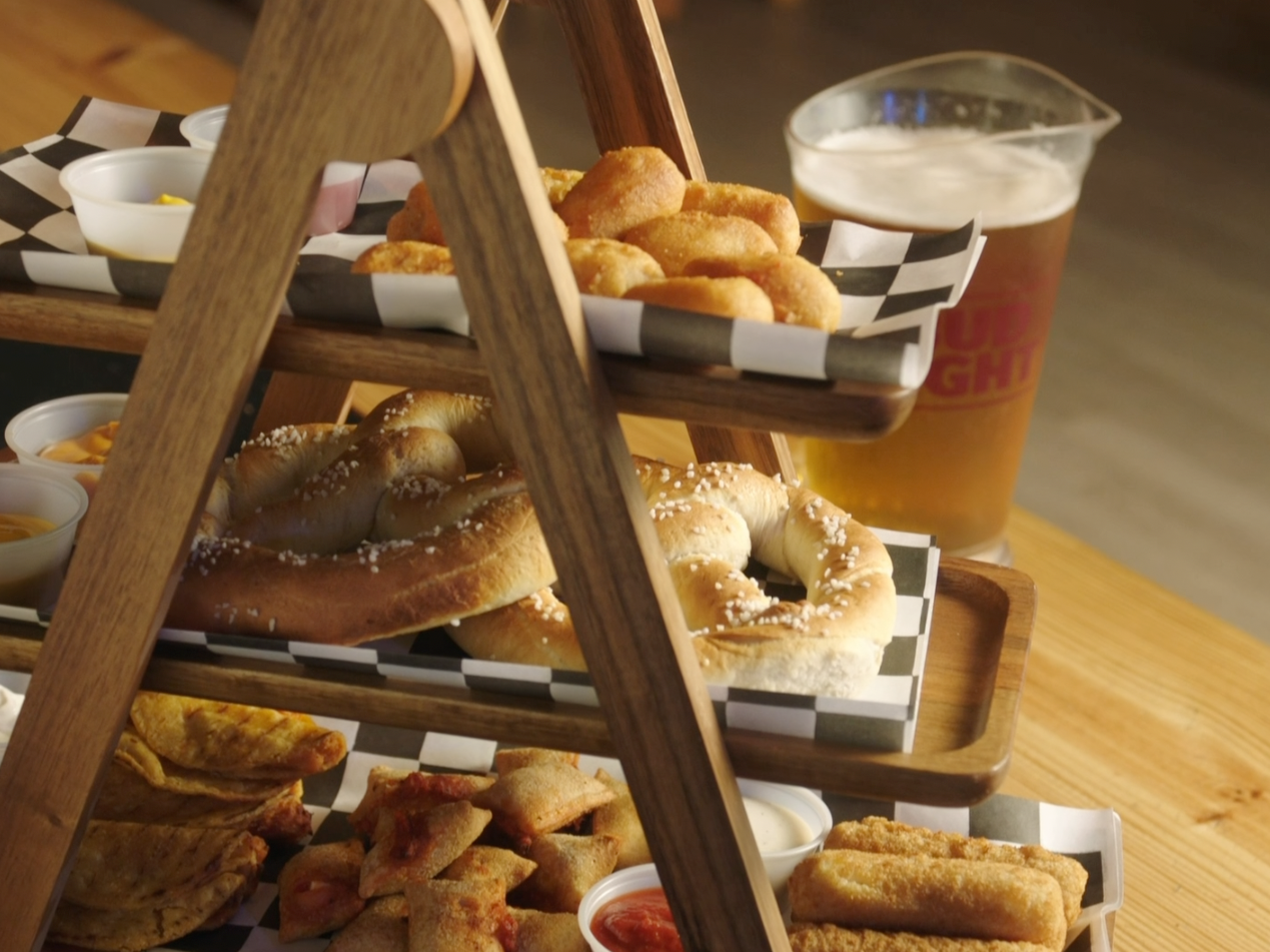 The Cut Axe Throwing in College Station has a full service bar and tasty snack menu. Perfect for family outings, dates, company events, and more.