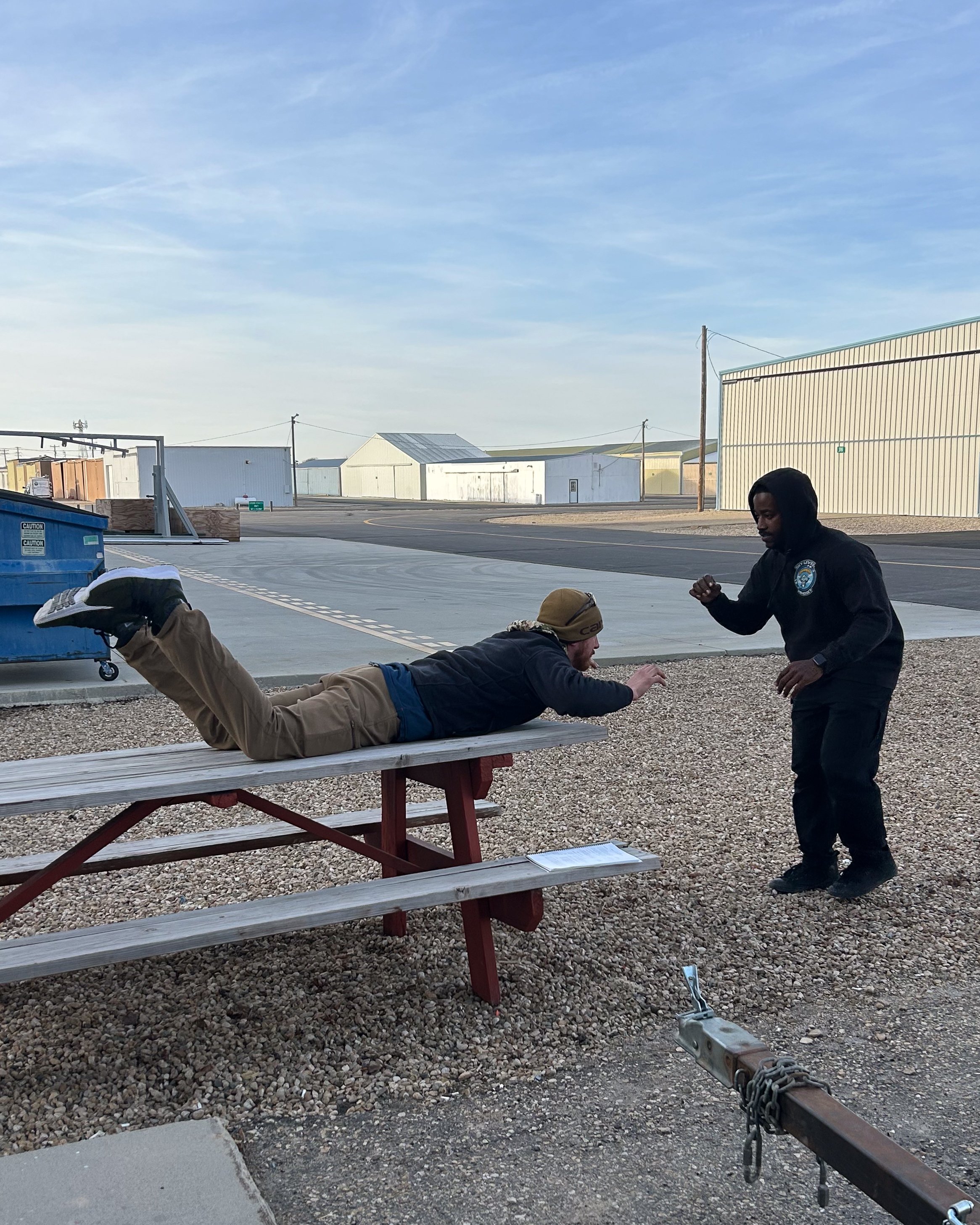 Coach candidates Mason Orme and O’Shea Abney practicing training drills together during the Skydive Skydown coach course.