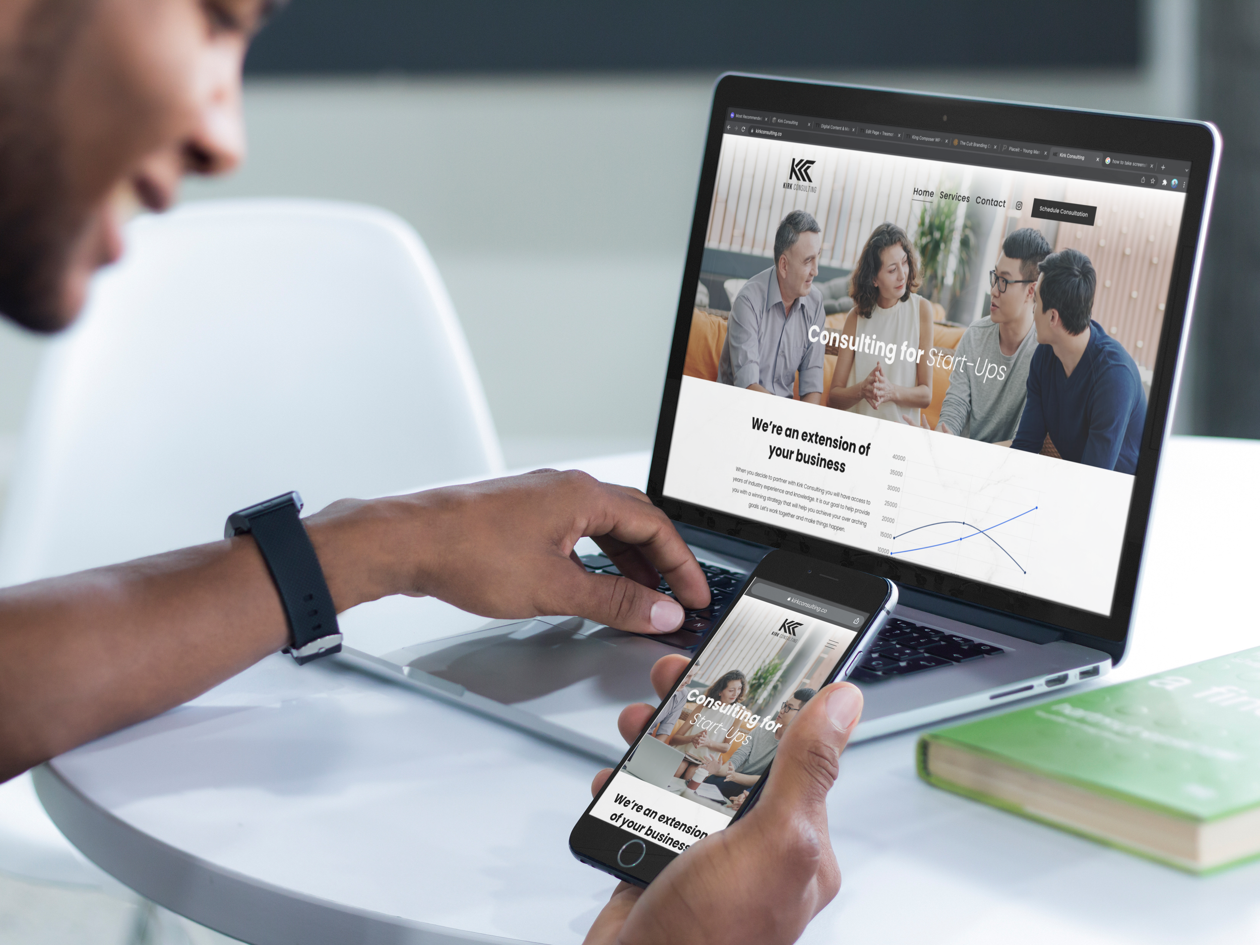 young-man-working-on-his-macbook-pro-laptop-and-iphone-6-mockup.png