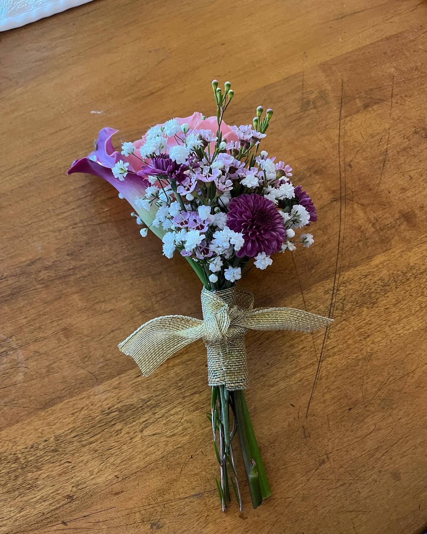 Little nosegay bouquet for the bride to be at her bridal party dinner.