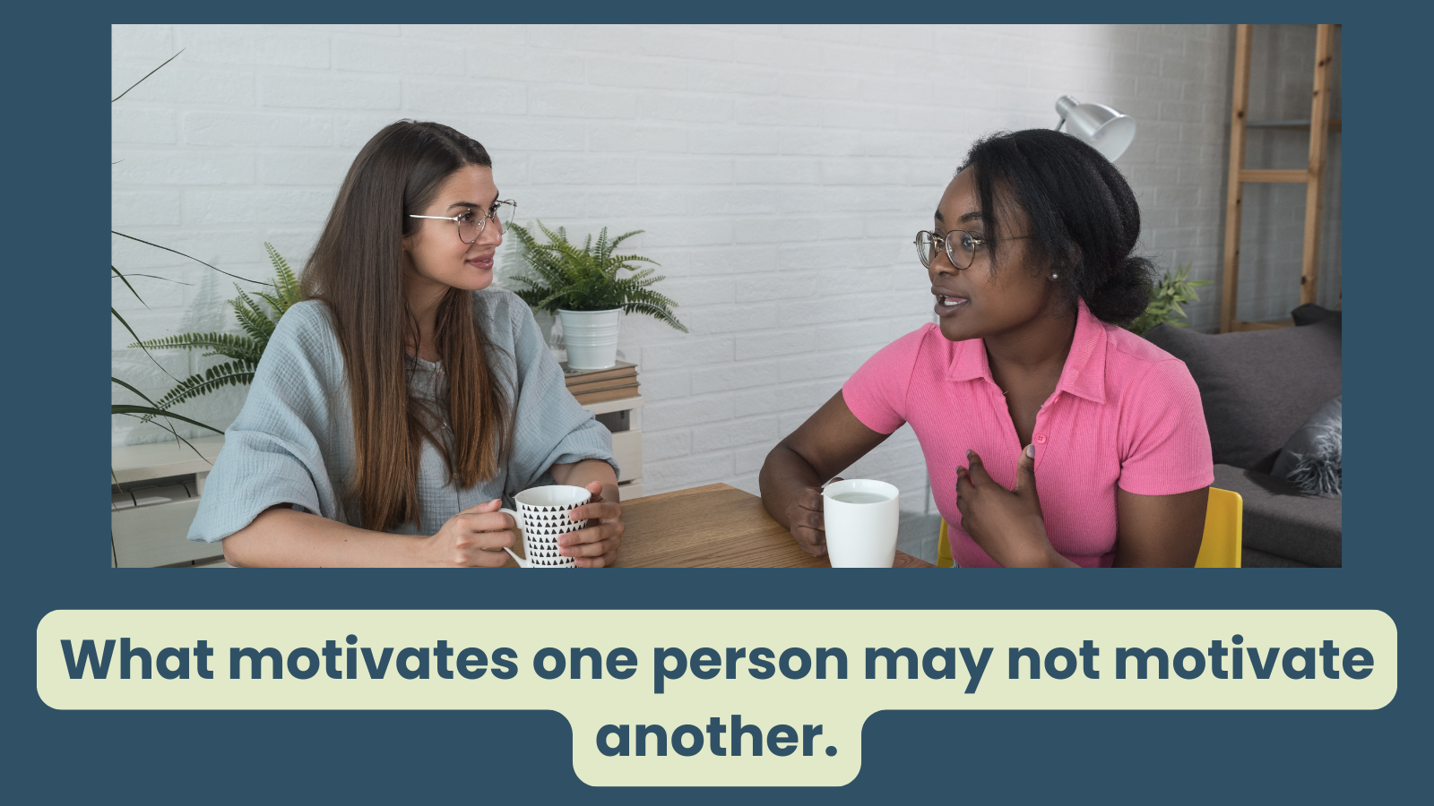 Two women are in deep conversation, they drink water, and one is gesturing towards her chest, indicating they are reffering to their own self