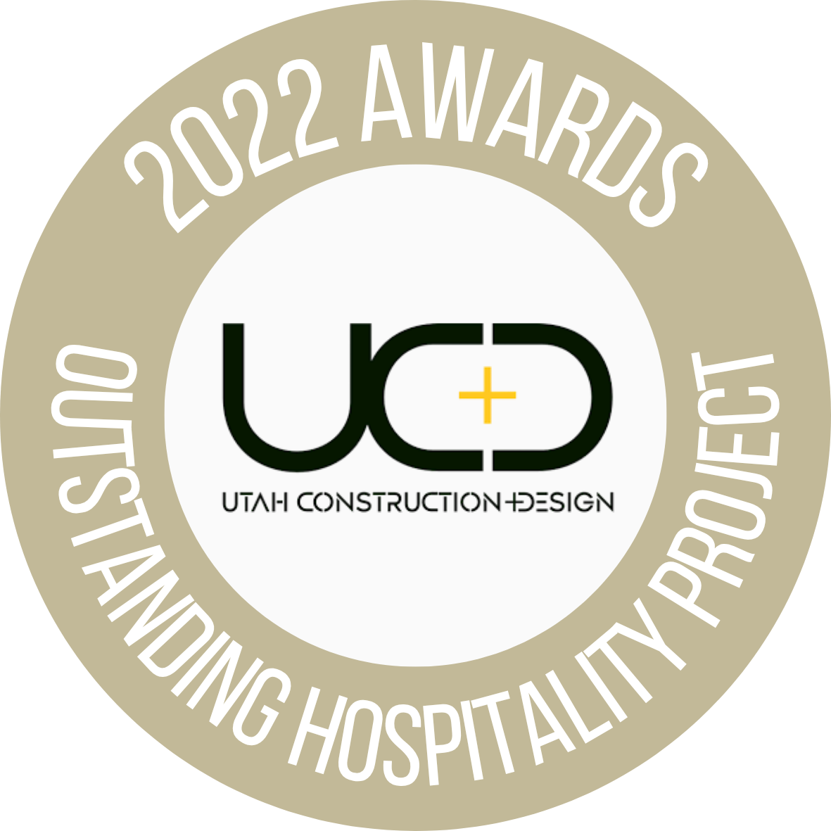 Circular badge with gold border reading '2022 Awards Outstanding Hospital Project,' featuring the Utah Construction + Design logo in the center.