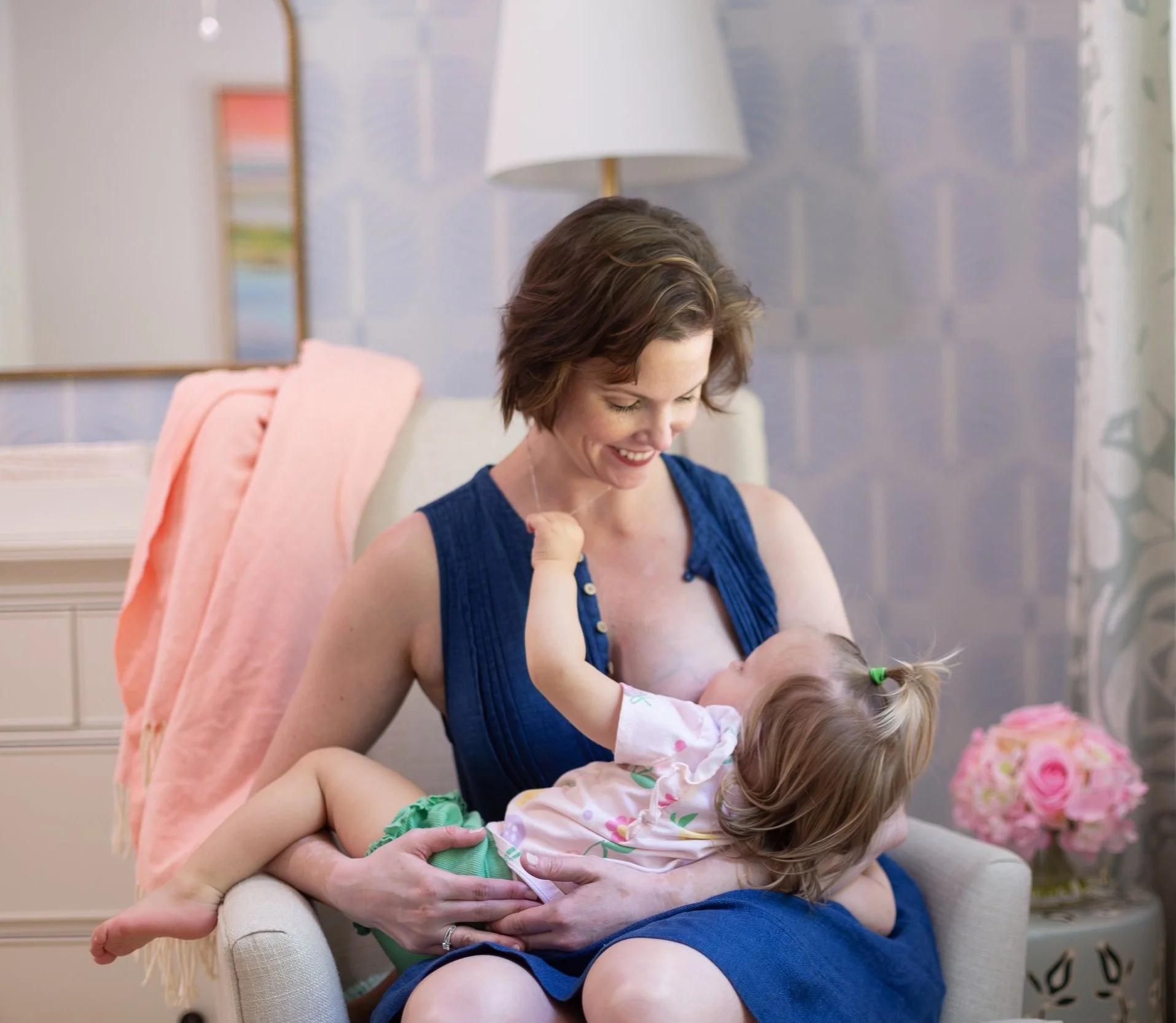 Lactation Consultant (IBCLC) Anna Barefoot breastfeeding her toddler