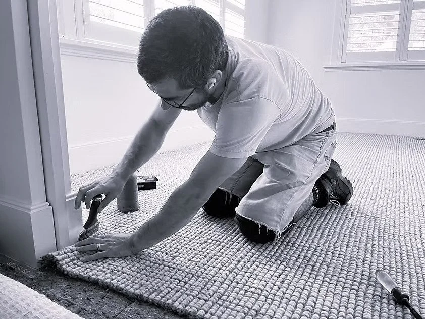 Skilled craftsperson installing Natural Fibre wool and jute in Adelaide