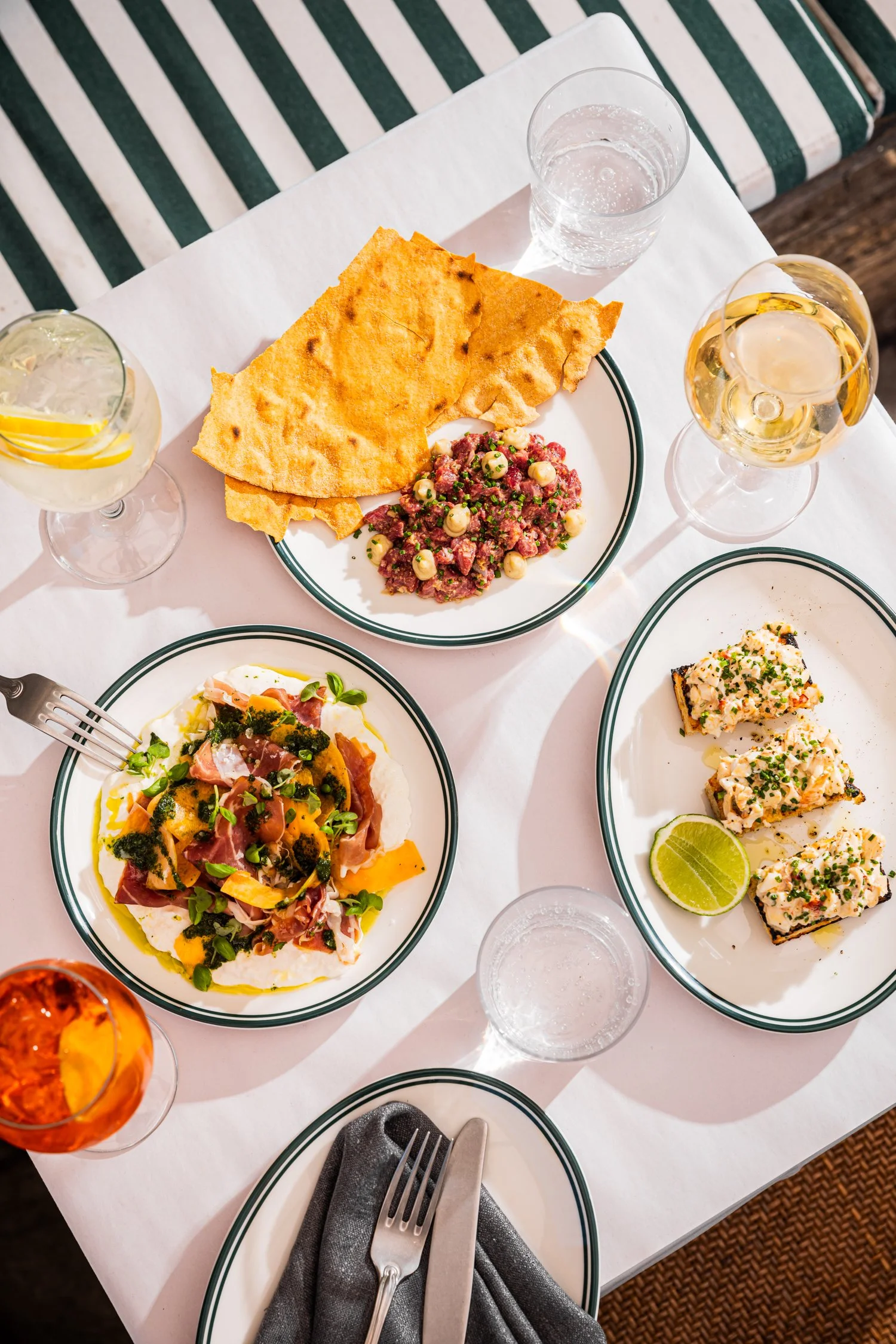A table filled with Italian Food in our sunny courtyard in Surry Hills