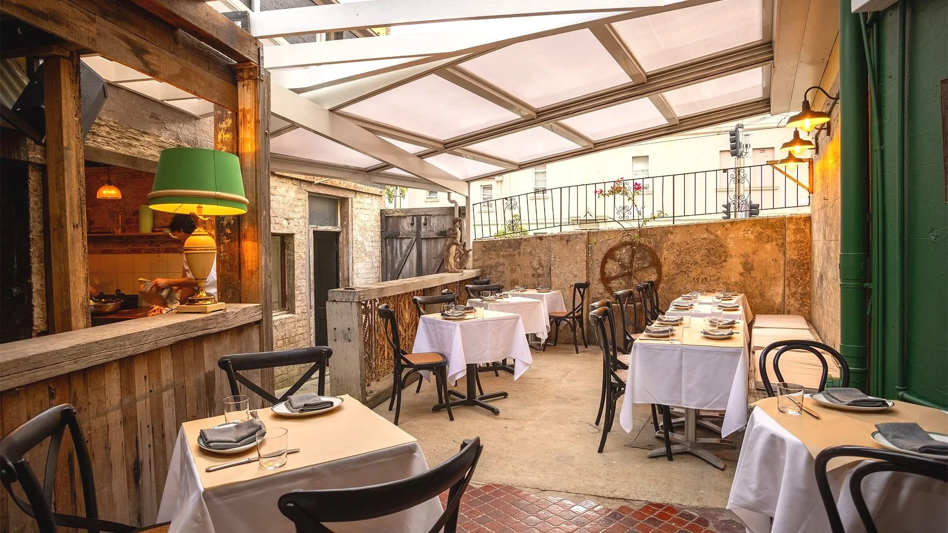 An image of our sunny hidden Italian Courtyard set up for functions, events, celebrations and birthday lunches