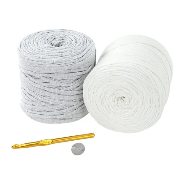 Retwisst zig zag bag kit contents showing t shirt yarn, crochet hook and button.