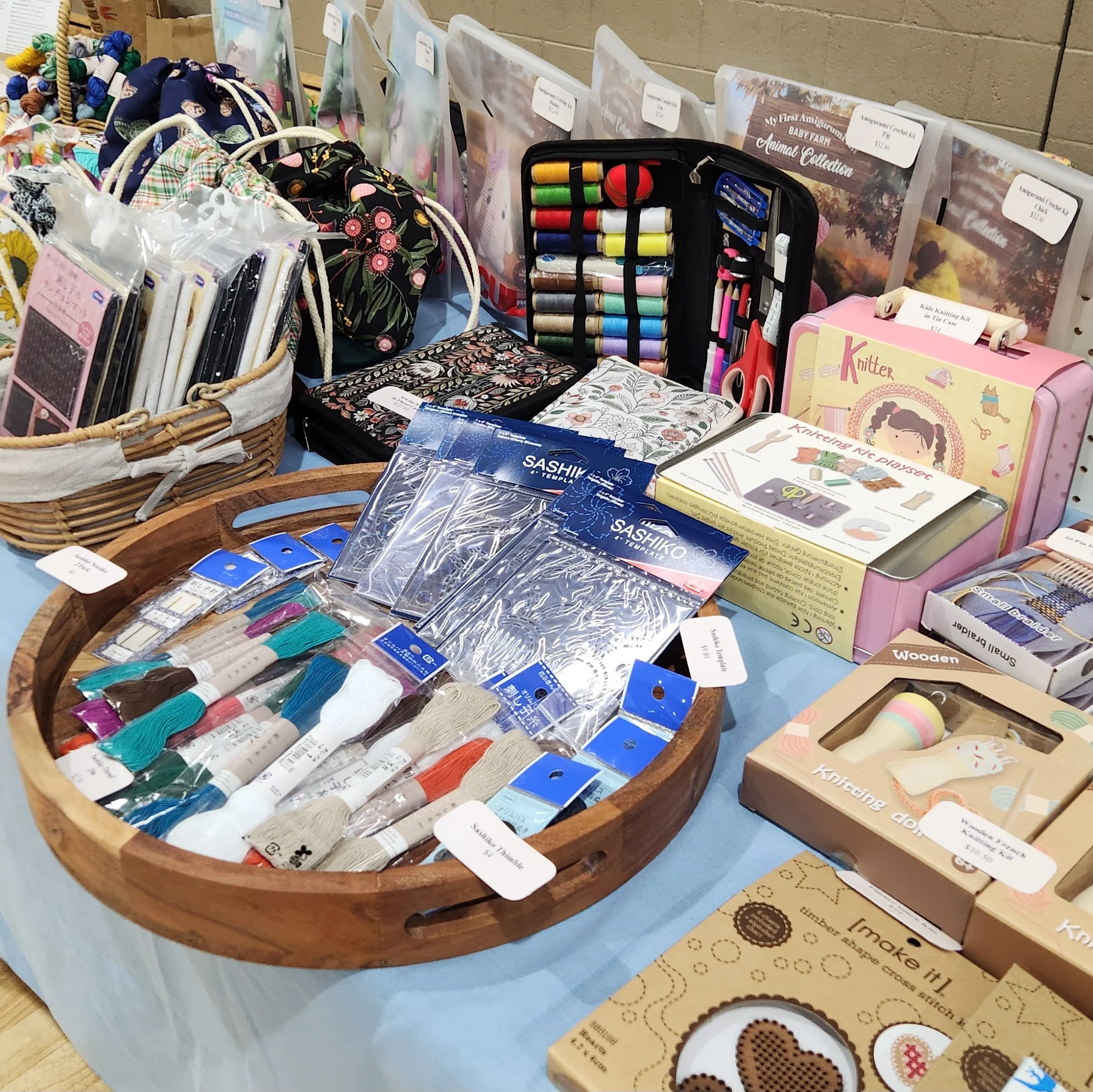 Market stall showing sashiko, sewing kits and knitting kits and other goodies!