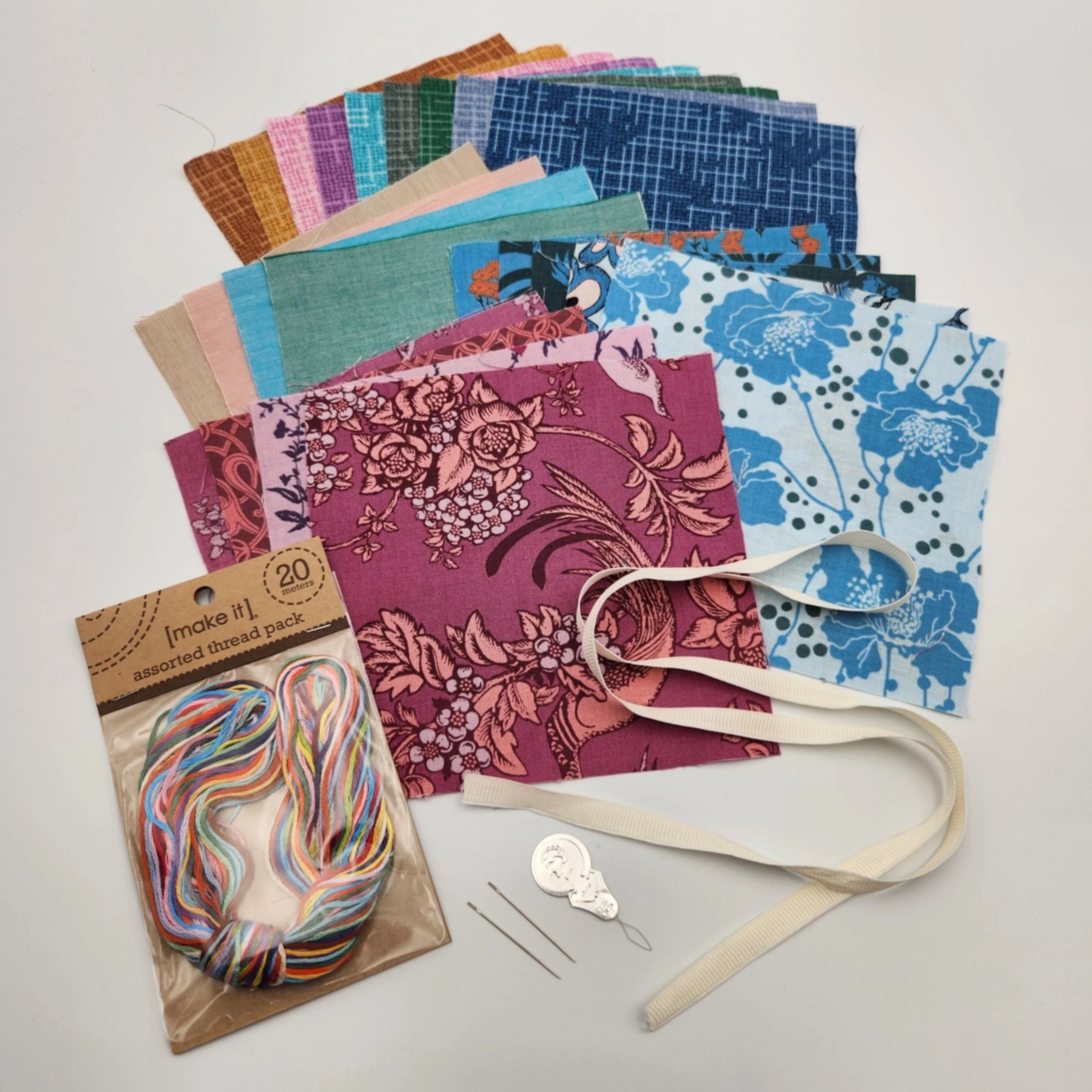 mending patch kit mixed colour pack with assorted fabric squares, embroidery thread, ribbon, needles and needle threader